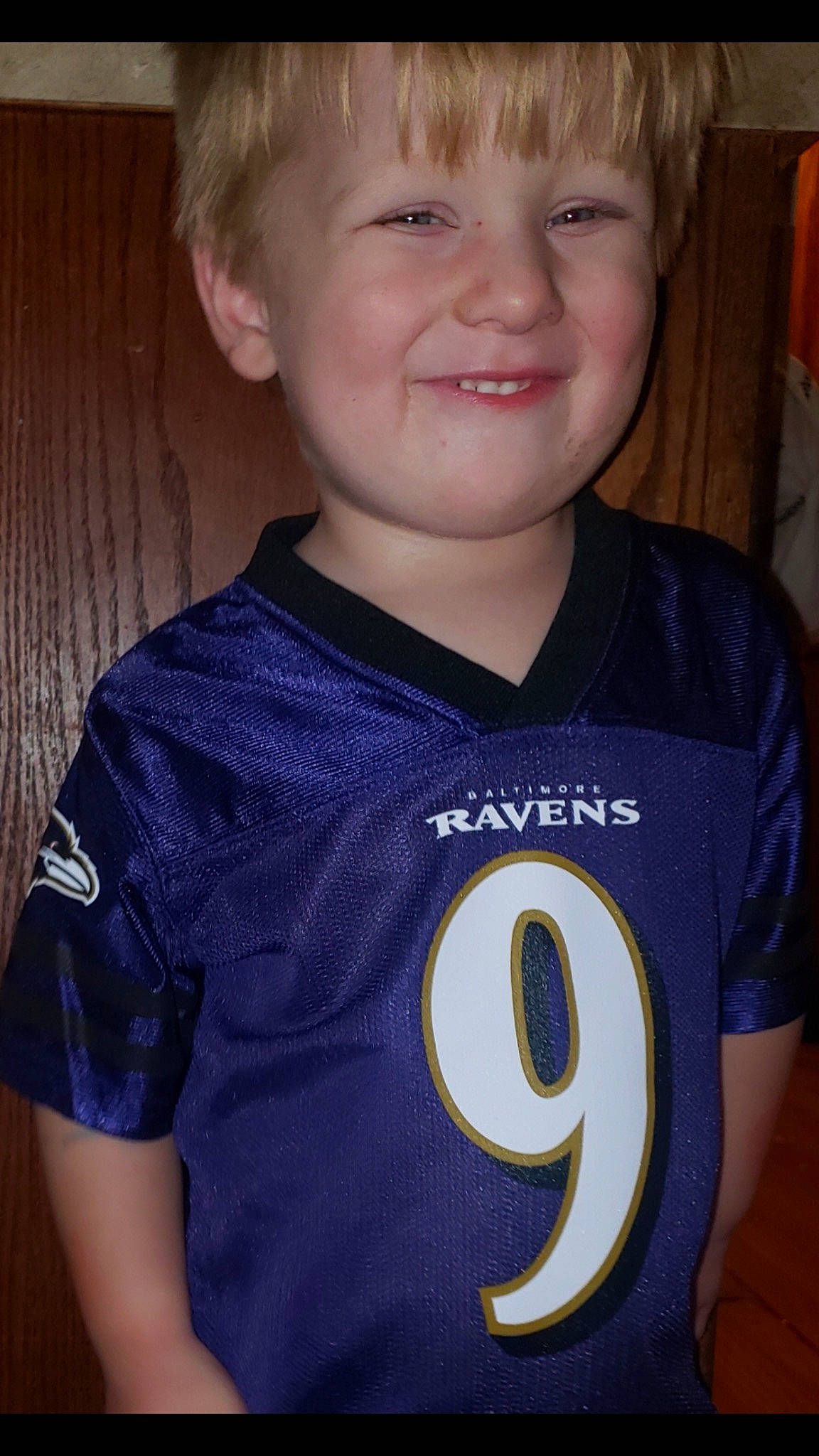 Todd is registered to the contest to win money with this photo: blue, child, cool, electric_blue, jersey, joy, number, person, sleeve, smile, sports_uniform, sportswear, t_shirt, toddler