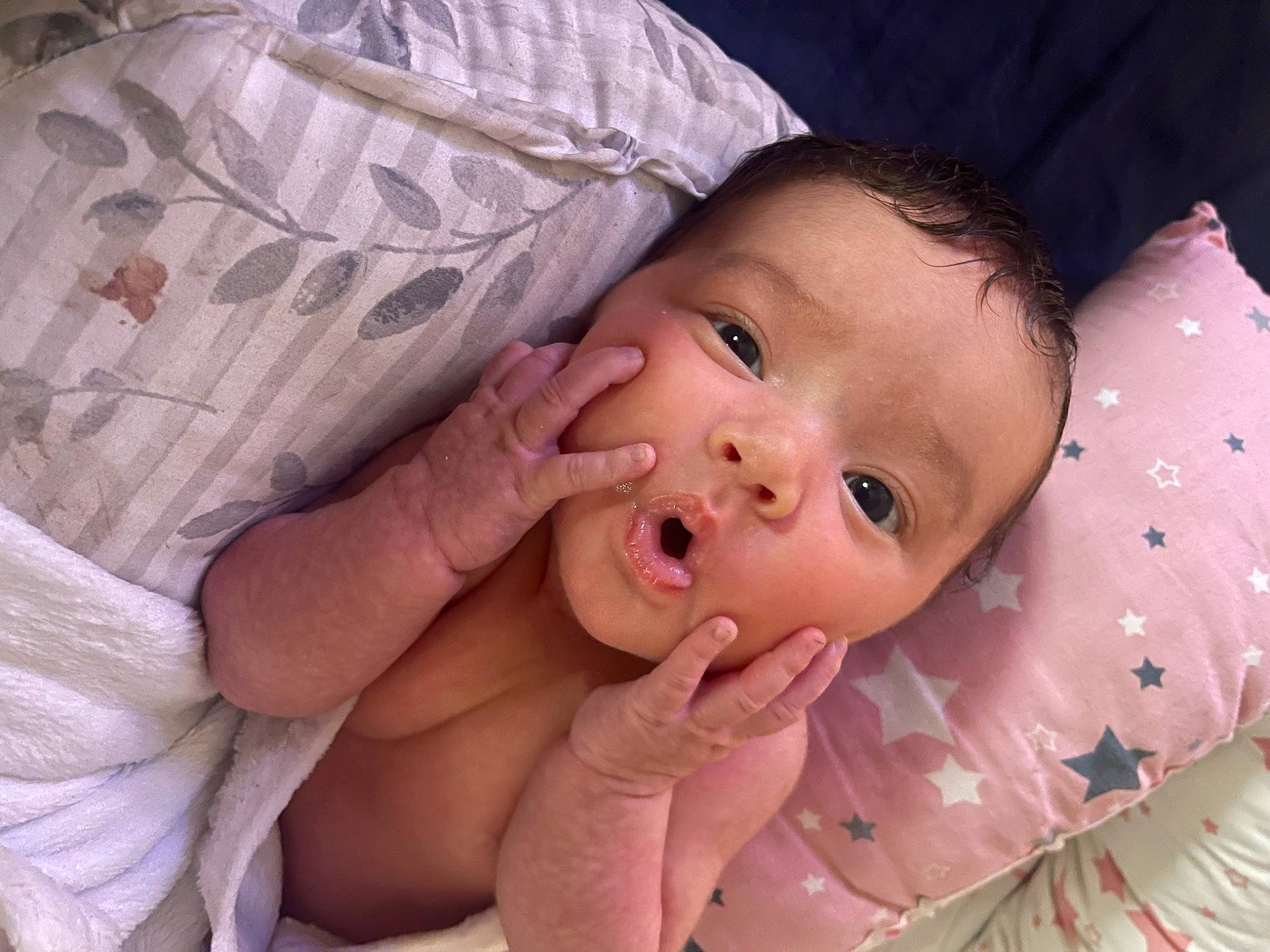 Irie is registered to the contest to win money with this photo: baby, baby_toddler_clothing, cheek, chin, comfort, eye, eyebrow, face, finger, gesture, happy, head, iris, lip, mouth, nose, person, pink, skin, textile