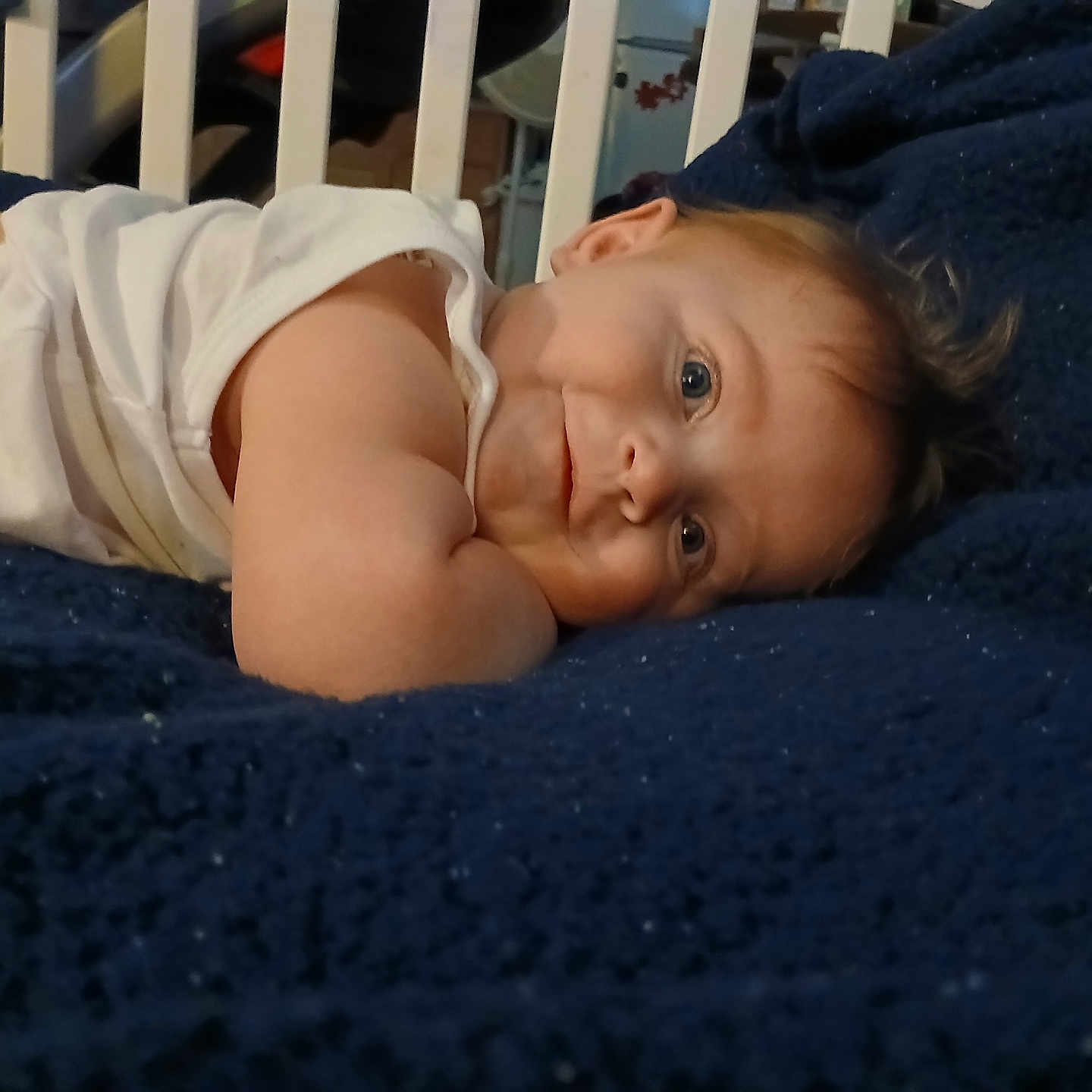 Damian joined the competition — help win amazing prizes! baby, bed, bedroom, blanket, bodypart, crib, face, finger, furniture, hand, happy, head, indoors, infantbed, newborn, person, photography, portrait, quilt, smile