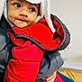 Aev Netik is registered to the contest to win money with this photo: animal_hat, baby, blue_jeans, child, clothing, coat, curious, cute, dimples, expression, face, hat, holding, indoor, person, portrait, red_jacket, toddler, warm_clothes, winter_wear