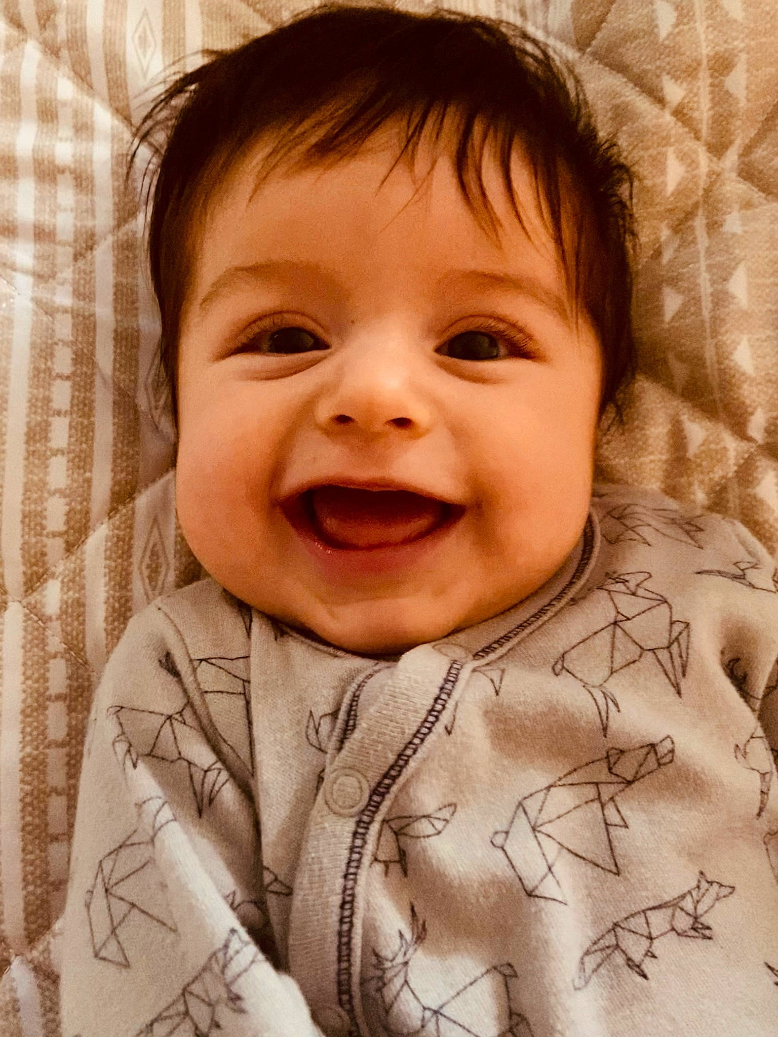 Fisher is registered to the contest to win money with this photo: baby, baby_toddler_clothing, cheek, chin, comfort, eyebrow, eyelash, face, facial_expression, forehead, happy, joy, lip, mouth, neck, nose, organ, person, product, skin