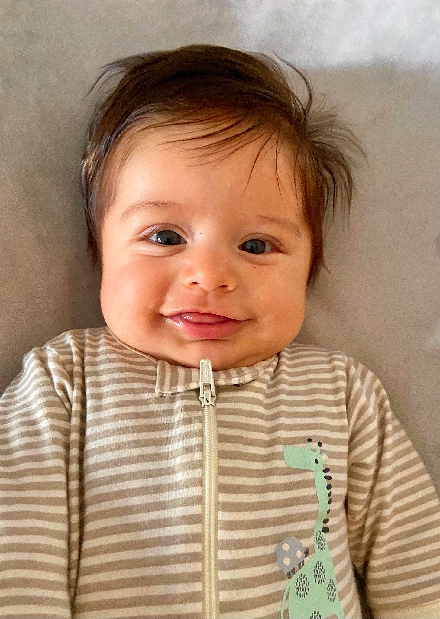 Fisher is registered to the contest to win money with this photo: baby, baby_toddler_clothing, cheek, collar, eye, eyebrow, eyelash, face, gesture, hair, happy, iris, joy, lip, neck, nose, outerwear, person, skin, sleeve