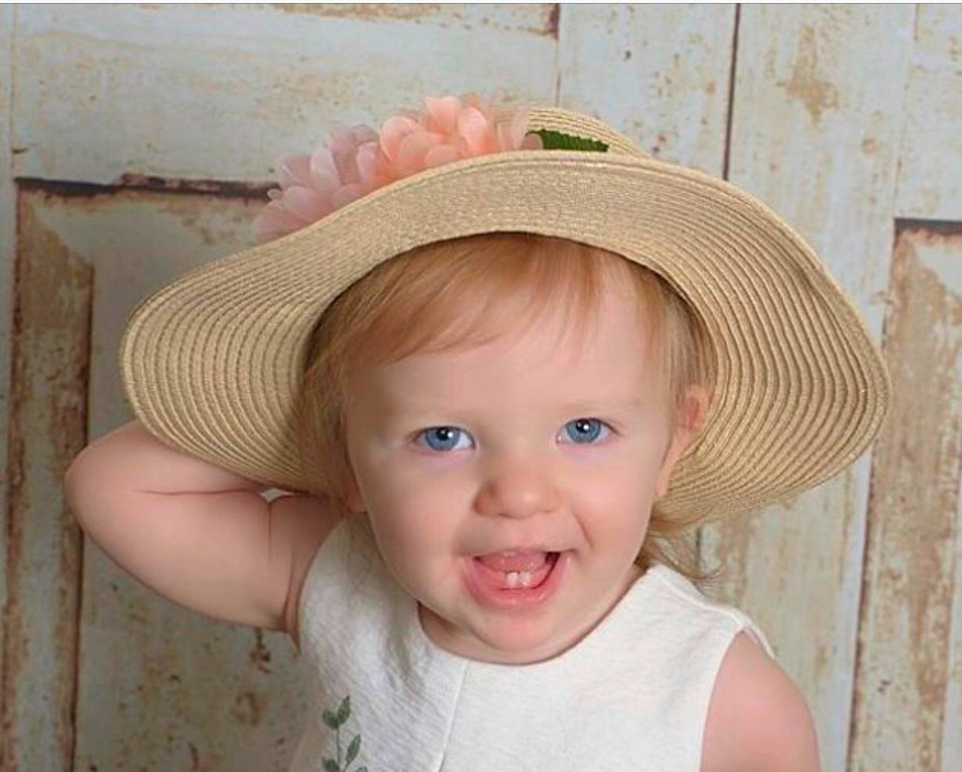 Hartley is registered to the contest to win money with this photo: bonnet, cap, cheek, child, cowboy_hat, fashion_accessory, fedora, hat, headgear, infant, joy, knit_cap, person, sun_hat, toddler