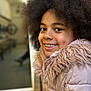 Kimberly is registered to the contest to win money with this photo: afro_hair, casual, child, childhood, closeup, cozy, cute, expression, face, fashion, fur_collar, happy, indoor, jacket, person, pink, portrait, smiling, warm_clothing, young
