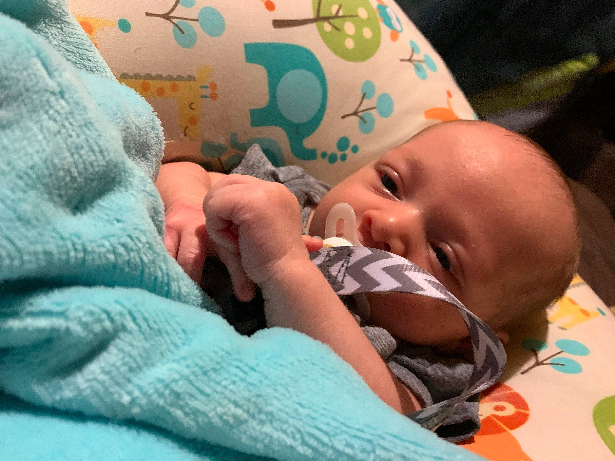 Graysen joined the competition — help win amazing prizes! baby, baby_products, baby_toddler_clothing, bedding, bedtime, blanket, cheek, child, comfort, finger, happy, linens, mouth, nap, pattern, person, room, sitting, skin, sleep