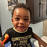 baby_walker, bathroom, cabinet, child, construction_zone, cute, decor, expression, face, furniture, hair, happy, indoor, person, shirt, smiling, teeth, toddler, toothbrush, wall_art