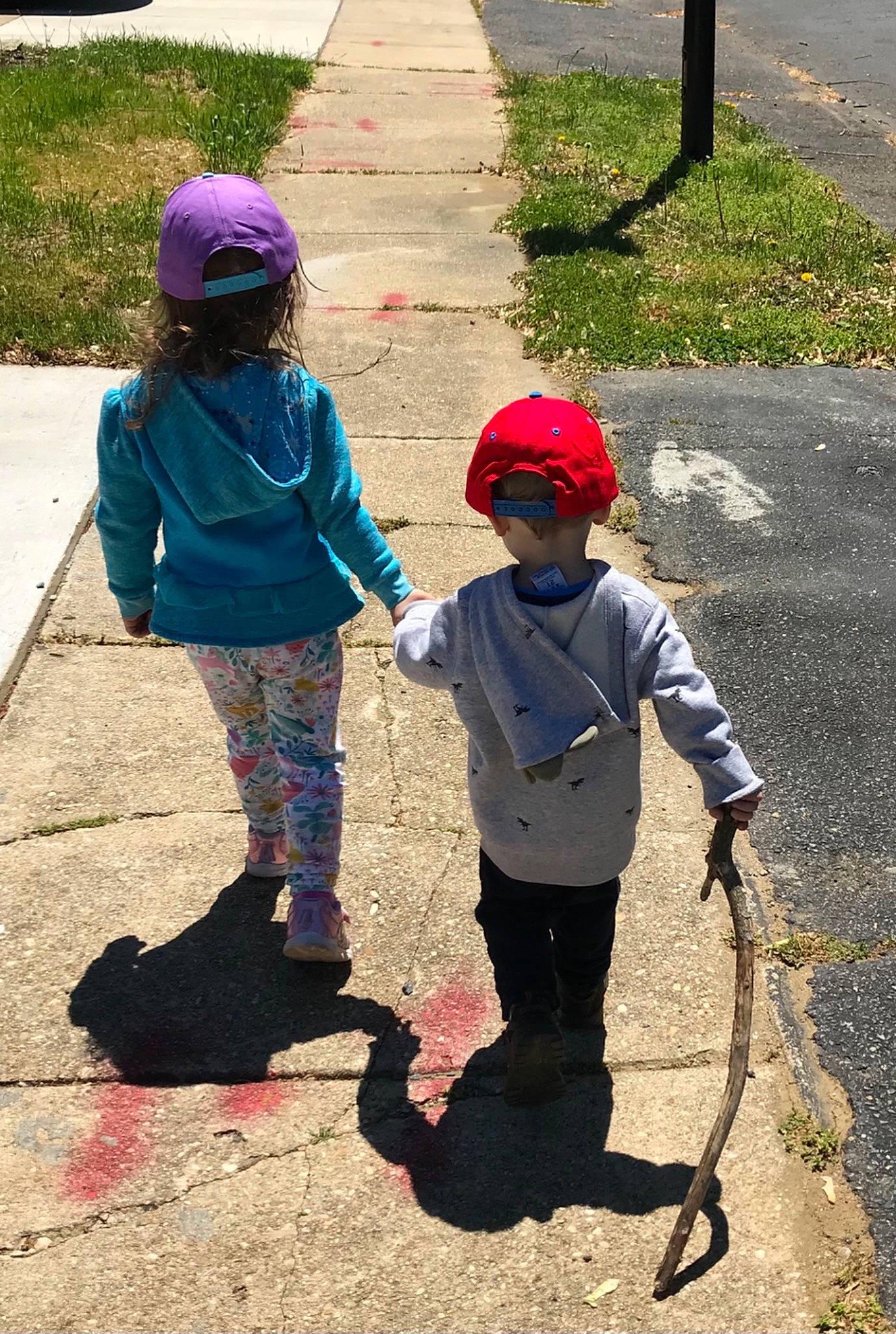 Michael Jr is registered to the contest to win money with this photo: asphalt, baseball_cap, cap, child, fun, grass, hat, human_settlement, leisure, people_in_nature, person, personal_protective_equipment, plant, play, recreation, road_surface, sidewalk, soil, toddler, tree