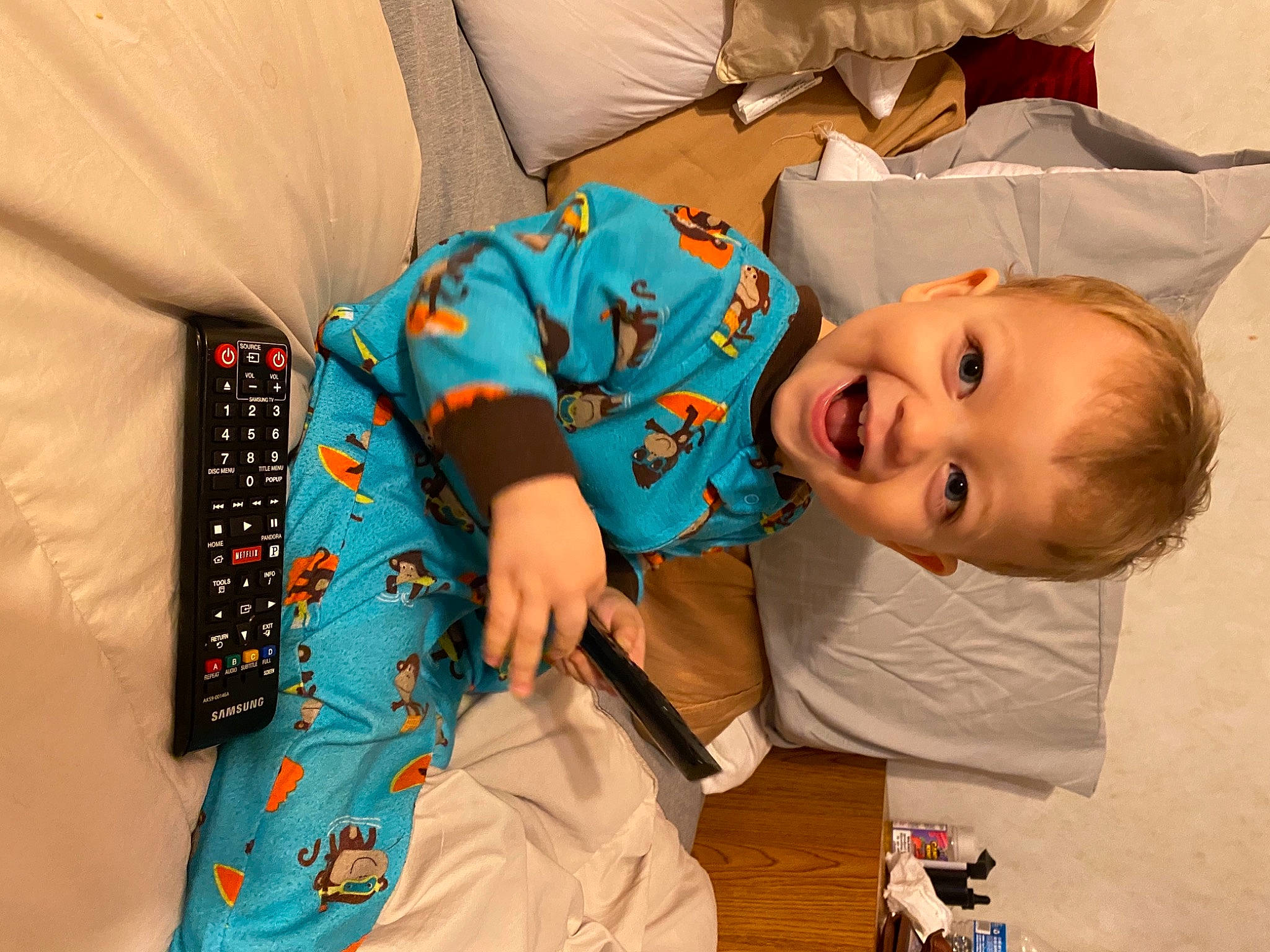 Michael Jr joined the competition — help win amazing prizes! baby, baby_products, baby_toddler_clothing, baby_toys, child, comfort, electric_blue, fun, happy, linens, orange, pattern, person, play, room, sitting, sleeve, smile, t_shirt, textile
