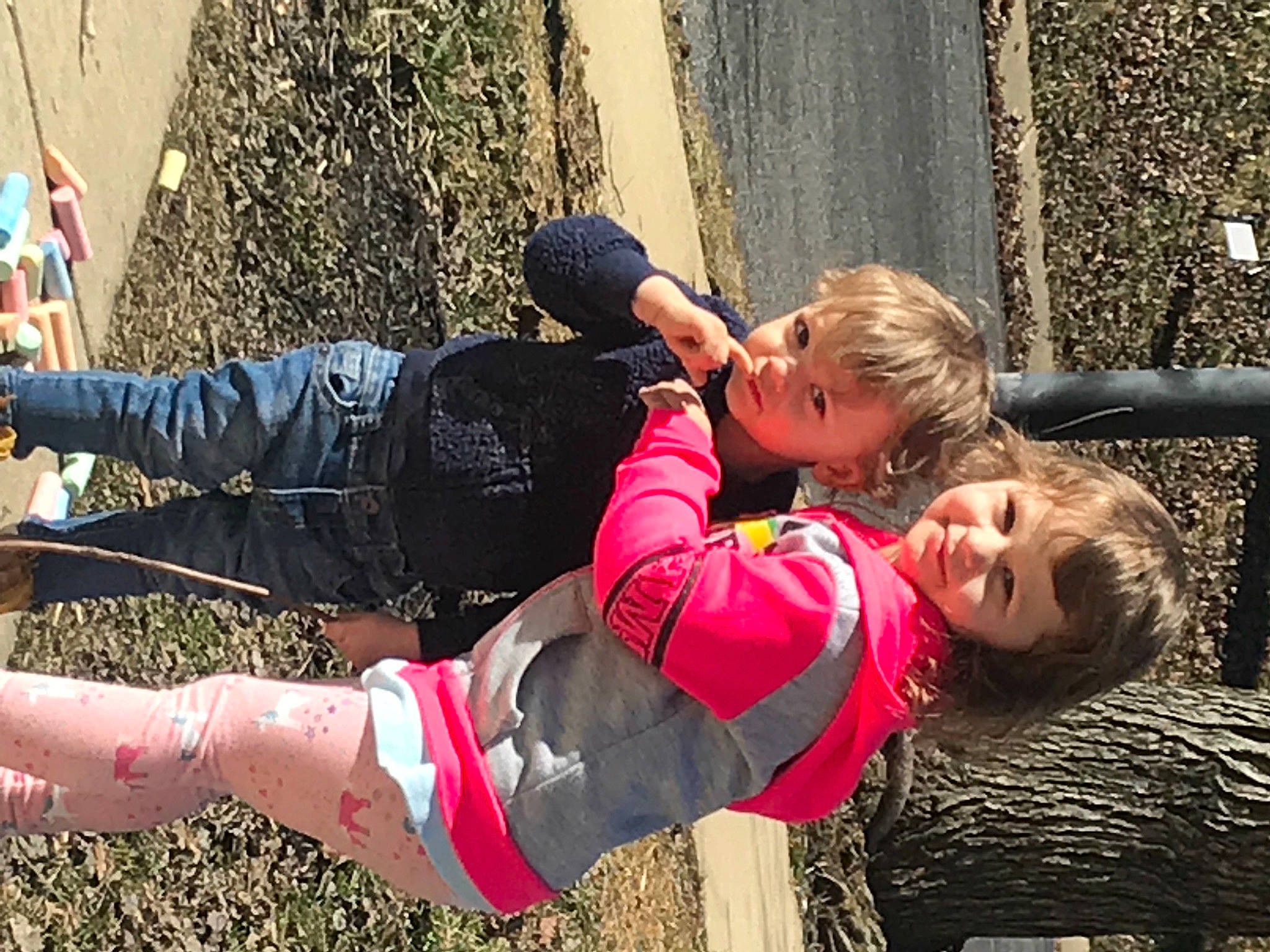 Mckenzie is registered to the contest to win money with this photo: arm, boot, fun, grass, happy, human_leg, joint, joy, knee, leg, leisure, luggage_and_bags, people_in_nature, person, play, recreation, sitting, street_fashion, thigh, toddler