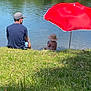 Grâce a rejoint le concours — aidez-le/la à gagner de superbes lots ! bank, child, family, grass, greenery, lake, man, nature, outdoor, peaceful, play, reflection, relaxation, sky, summer, sunhat, toddler, trees, umbrella, water