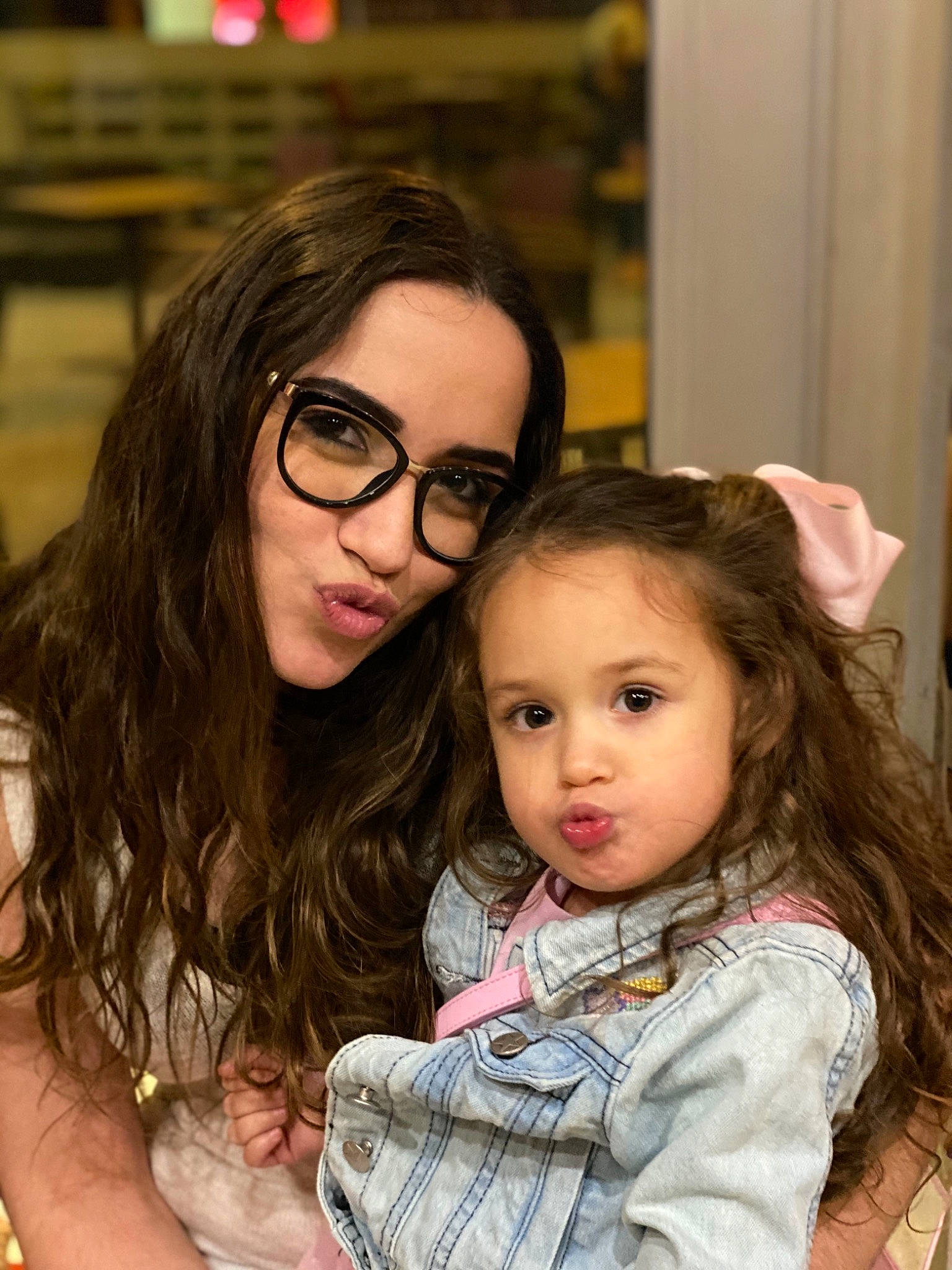 Maria is registered to the contest to win money with this photo: brown_hair, child, eyewear, glasses, hair, hairstyle, long_hair, person, smile, toddler, vision_care