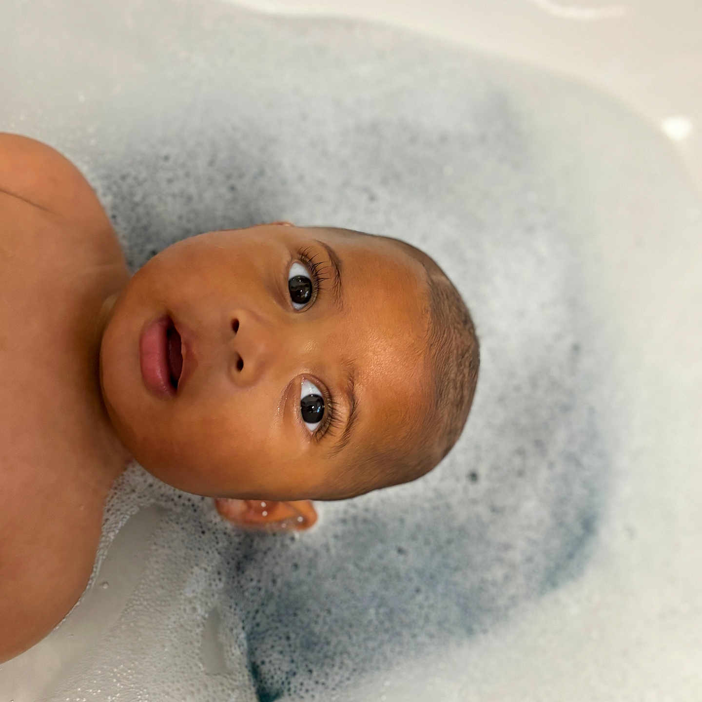 Grayson joined the competition — help win amazing prizes! baby, bath, bubbles, child, closeup, cute, expression, eyes, face, foam, head, infant, person, portrait, relaxation, skin, tub, water, wet, young