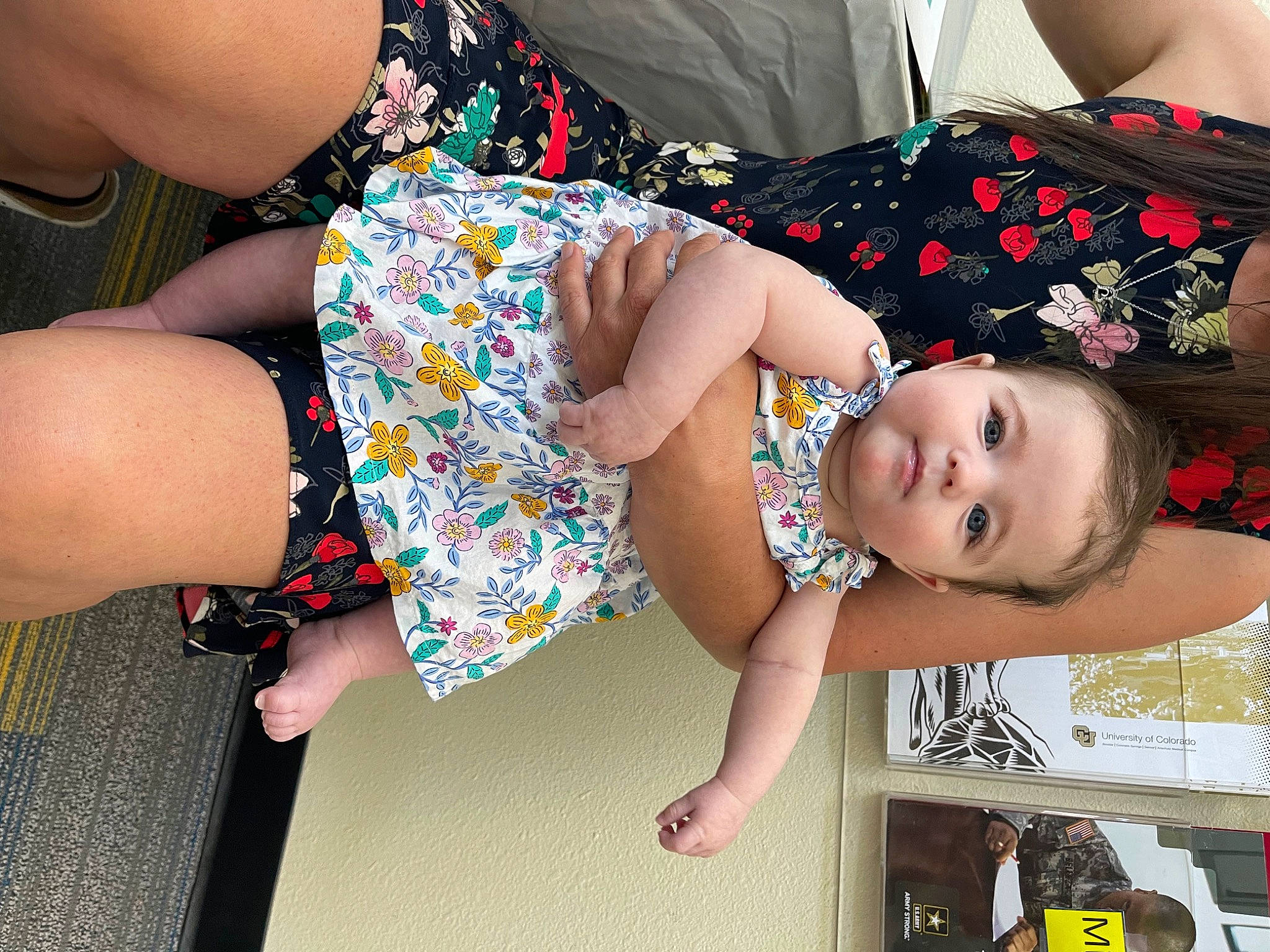 Lorelei is registered to the contest to win money with this photo: arm, baby, baby_toddler_clothing, child, glasses, happy, human_body, human_leg, joint, knee, pattern, person, pink, skin, sleeve, textile, thigh, toddler, trunk, waist