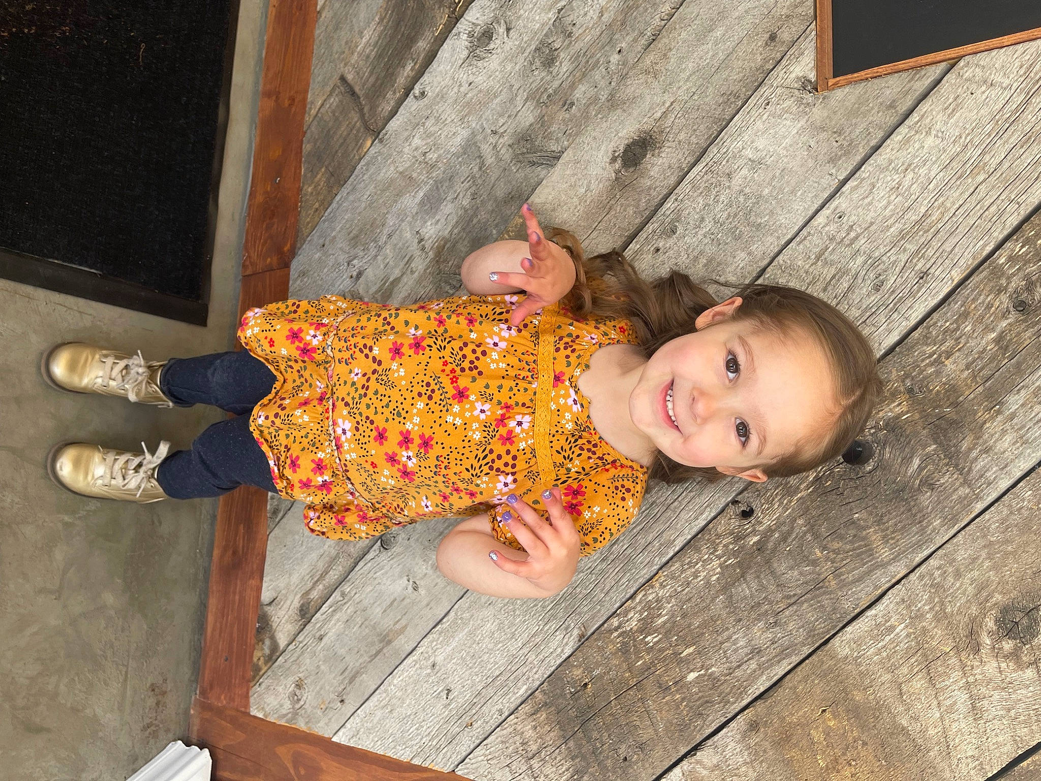Charlee joined the competition — help win amazing prizes! baby, baby_toddler_clothing, child, clothing, floor, flooring, foot, fun, grass, happy, hardwood, joy, leg, pattern, person, sitting, skin, smile, toddler, tree