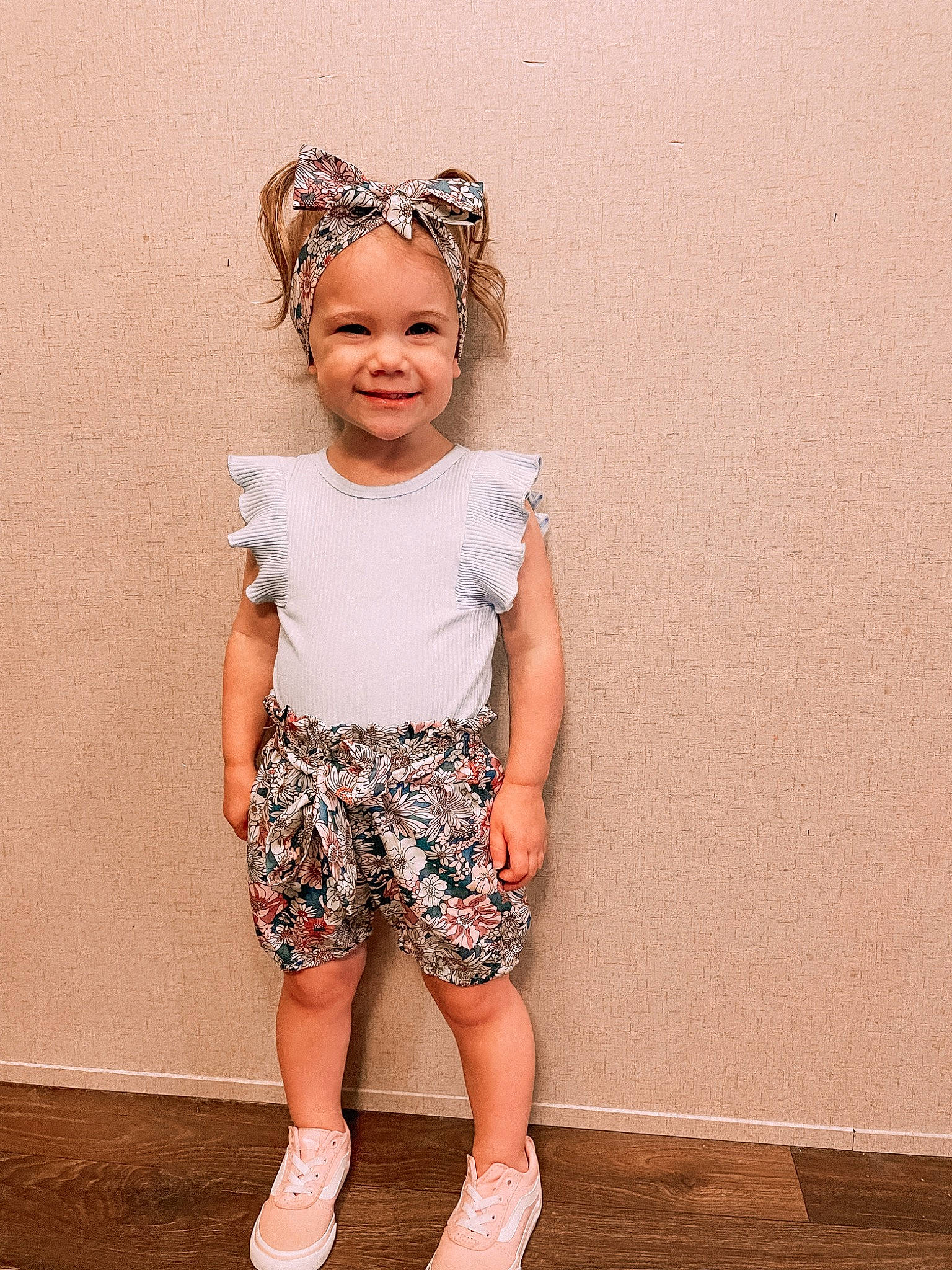 Rylee is registered to the contest to win money with this photo: arm, baby_toddler_clothing, eyewear, fashion_design, happy, head, headwear, human_leg, joy, knee, leg, neck, pattern, person, shorts, shoulder, sleeve, smile, t_shirt, thigh