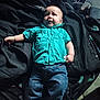 Jayson joined the competition — help win amazing prizes! baby, bed, blanket, blue_jeans, casual_clothing, child, clothing, comfort, expression, foot, hand, indoor, infant, lying_down, person, portrait, relaxed, soft_lighting, turquoise_shirt, young_child