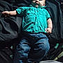 baby, blanket, casual, child, clothing, comfortable, cute, face, feet, hand, indoor, infant, jeans, lying_down, person, portrait, resting, shirt, soft_lighting, young