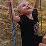 Lilly Mei joined the competition — help win amazing prizes! child, swing, smile, outdoor, grass, rope, wood, dog, autumn, leaves, play, happy, person, black_clothing, daylight, yard, nature, fun, tree, recreation