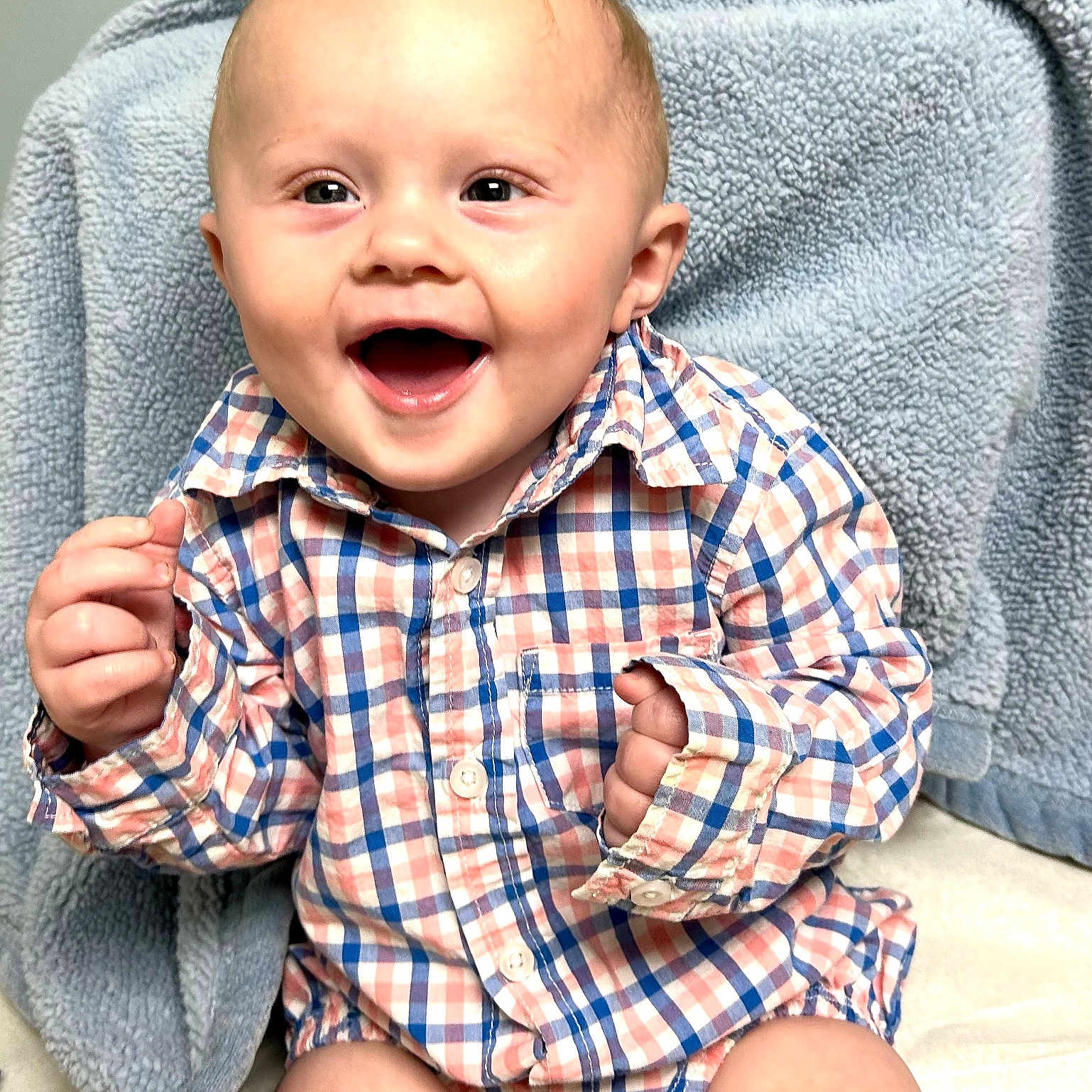 Kage joined the competition — help win amazing prizes! baby, blanket, child, clothing, comfort, cute, expression, face, hands, happy, indoors, infant, joy, plaid, portrait, shirt, sitting, skin, smiling, young