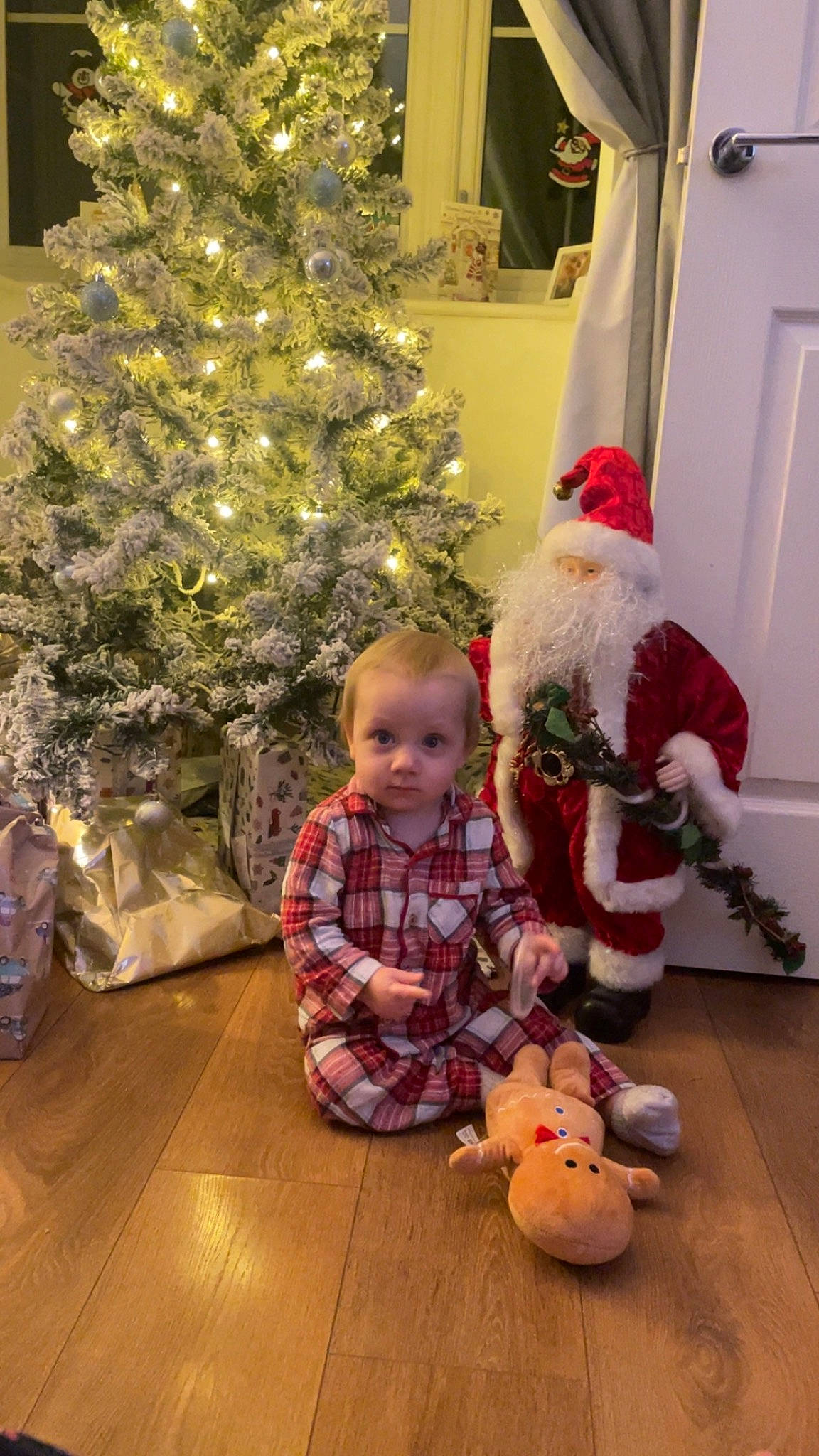 Noah joined the competition — help win amazing prizes! child, christmas, christmas_decoration, christmas_eve, christmas_ornament, christmas_tree, door, event, fun, hat, holiday, holiday_ornament, lap, ornament, people, person, snapshot, standing, toddler, toy
