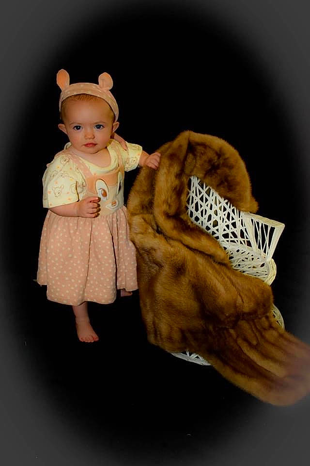 Lillianna is registered to the contest to win money with this photo: brown_hair, child, doll, ear, fictional_character, figurine, fur, headgear, person, toy