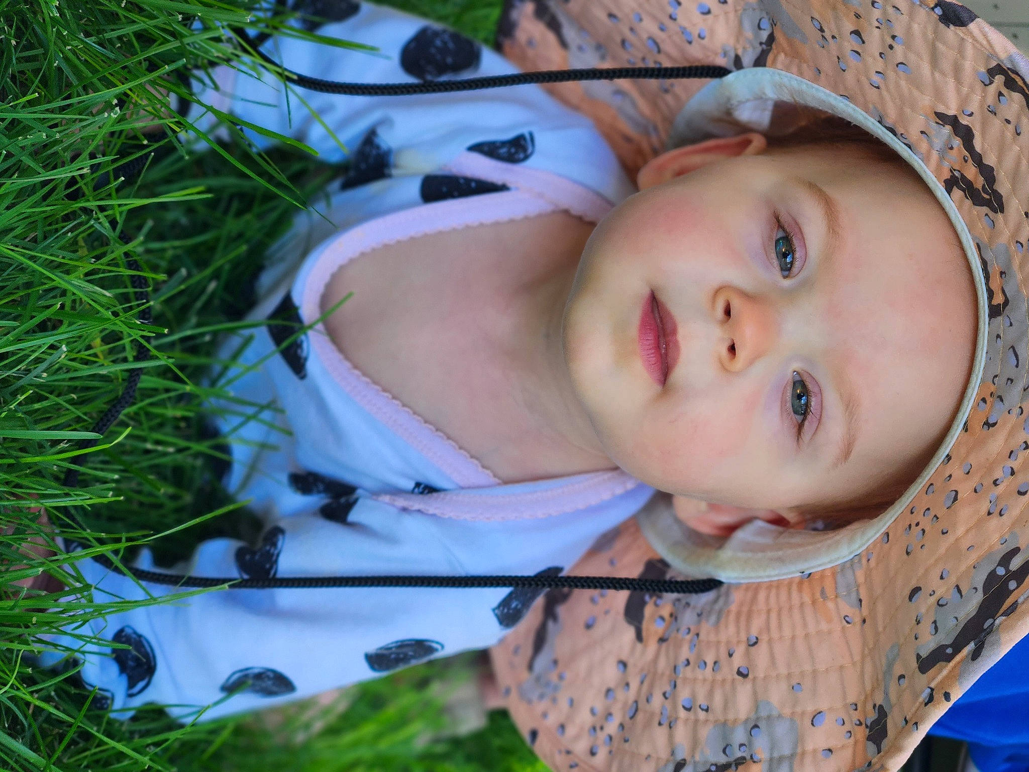 Remington joined the competition — help win amazing prizes! baby, baby_toddler_clothing, cheek, eye, fun, grass, happy, hat, headwear, iris, lip, nose, pattern, people_in_nature, person, plant, skin, smile, sun_hat, toddler