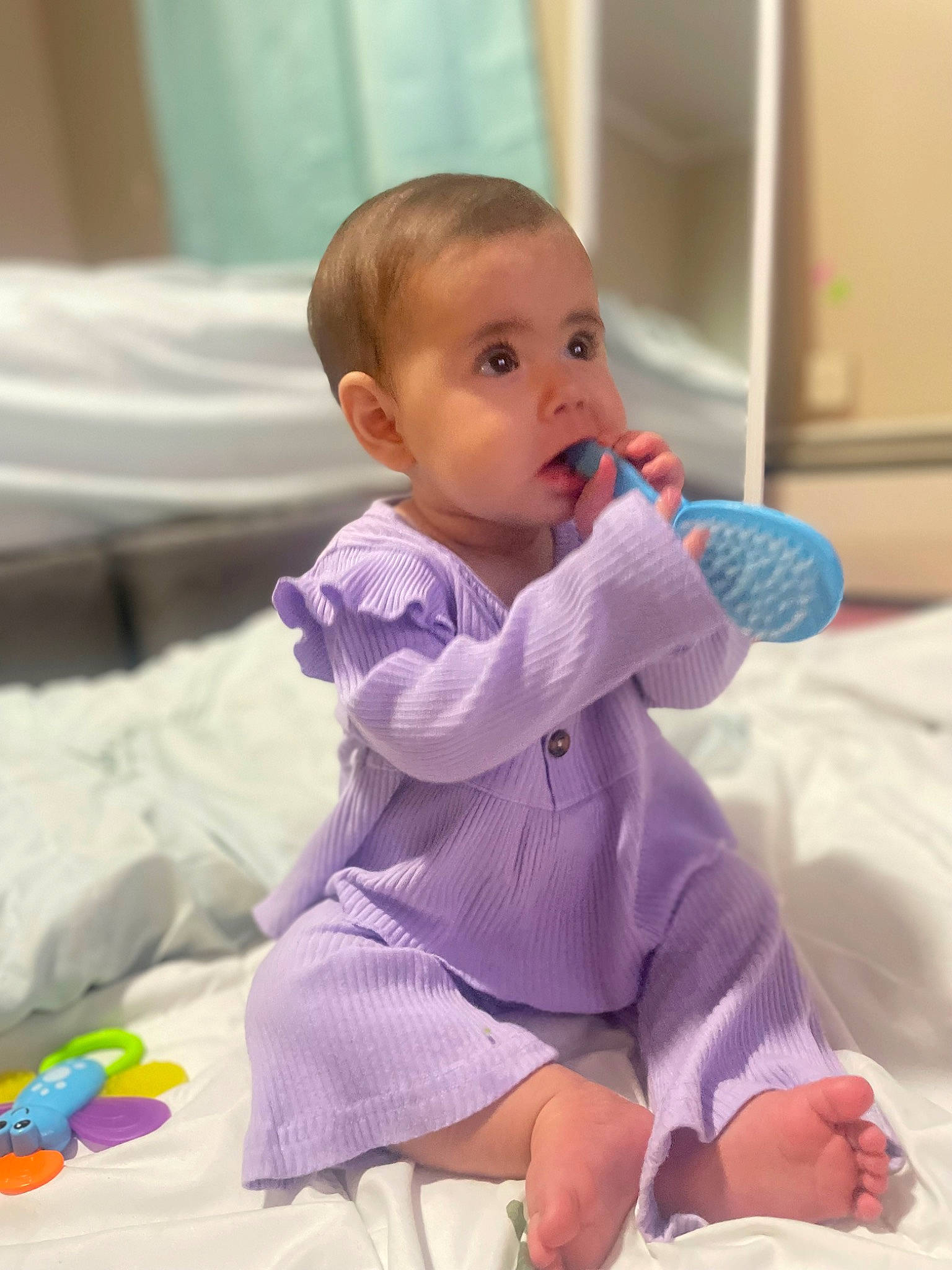 Aeris joined the competition — help win amazing prizes! baby, baby_toddler_clothing, cheek, child, comfort, flooring, foot, fun, happy, head, knee, linens, person, play, purple, sitting, skin, sleeve, sock, surprise