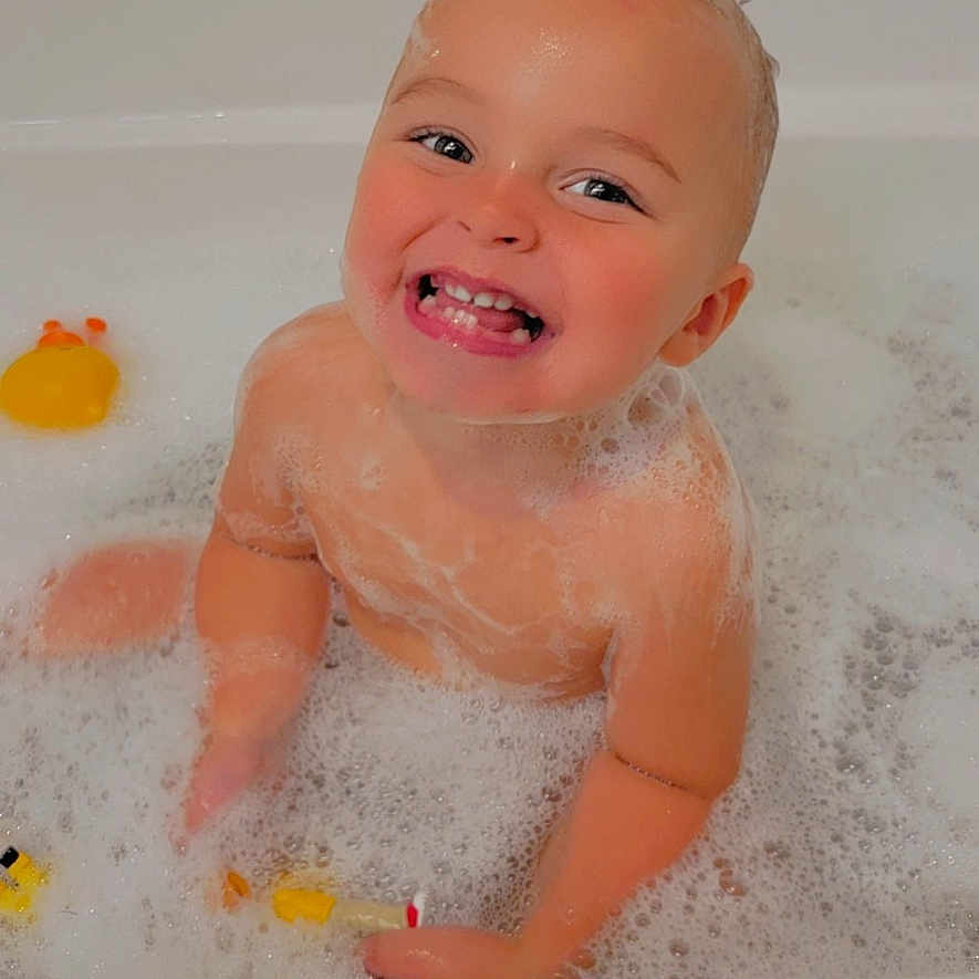 Brantley joined the competition — help win amazing prizes! baby, bathing, bathtub, bodypart, bubble, face, finger, hand, happy, head, hottub, leisureactivities, person, photography, portrait, sport, swimming, tub, water, watersports