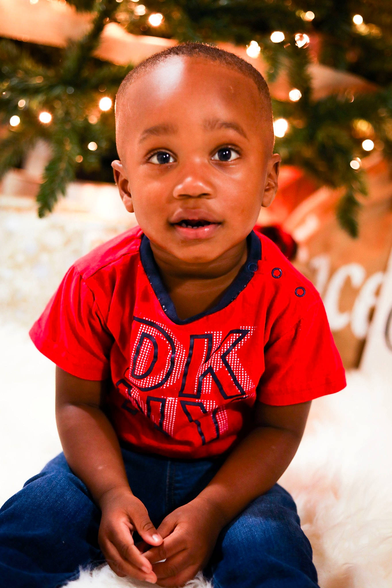 Brycen is registered to the contest to win money with this photo: cheek, child, chin, eye, face, flash_photography, fun, hairstyle, happy, head, human, human_body, jeans, leisure, lip, people_in_nature, person, skin, standing, toddler