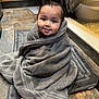 baby, barefoot, bath, bathroom, child, cozy, cute, floor_mat, happy, home, indoors, person, portrait, skin, smile, tile_floor, towel, wet_hair, wrapped, young_child