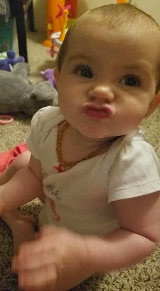 Annaliese joined the competition — help win amazing prizes! baby, baby_toddler_clothing, cheek, chest, child, dress, eyelash, finger, fun, grass, happy, iris, lip, mouth, nose, person, sitting, skin, sleeve, thumb