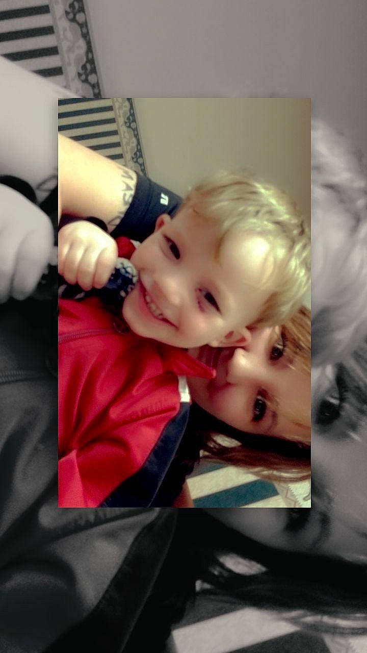 Tanner is registered to the contest to win money with this photo: art, baby, cheek, child, comfort, cool, electronic_device, eyebrow, eyelash, flash_photography, gesture, hairstyle, happy, iris, joy, lip, mouth, person, skin, smile