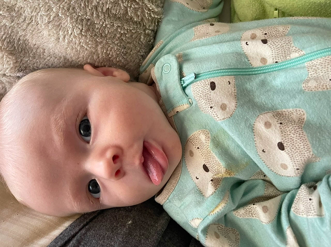 Xander joined the competition — help win amazing prizes! baby, baby_toddler_clothing, cheek, chin, eye, eyebrow, eyelash, grass, green, head, headgear, lip, mouth, nose, organ, person, skin, textile, toddler, white