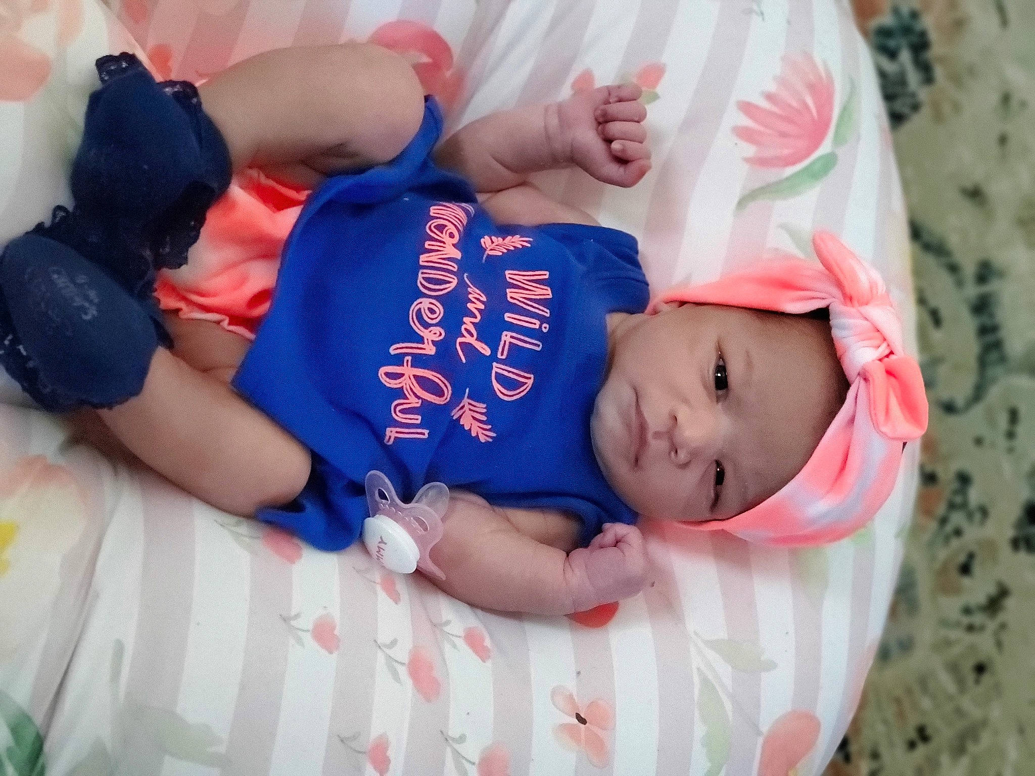 Chloé is registered to the contest to win money with this photo: baby, baby_products, baby_toddler_clothing, child, happy, headwear, person, product, toddler