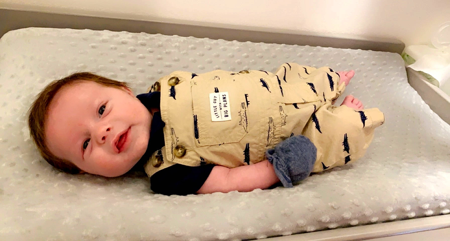 Gatlin joined the competition — help win amazing prizes! baby, baby_sleeping, baby_toddler_clothing, cheek, child, comfort, eye, flash_photography, flooring, happy, head, linens, person, room, sitting, skin, sleeve, smile, textile, toddler