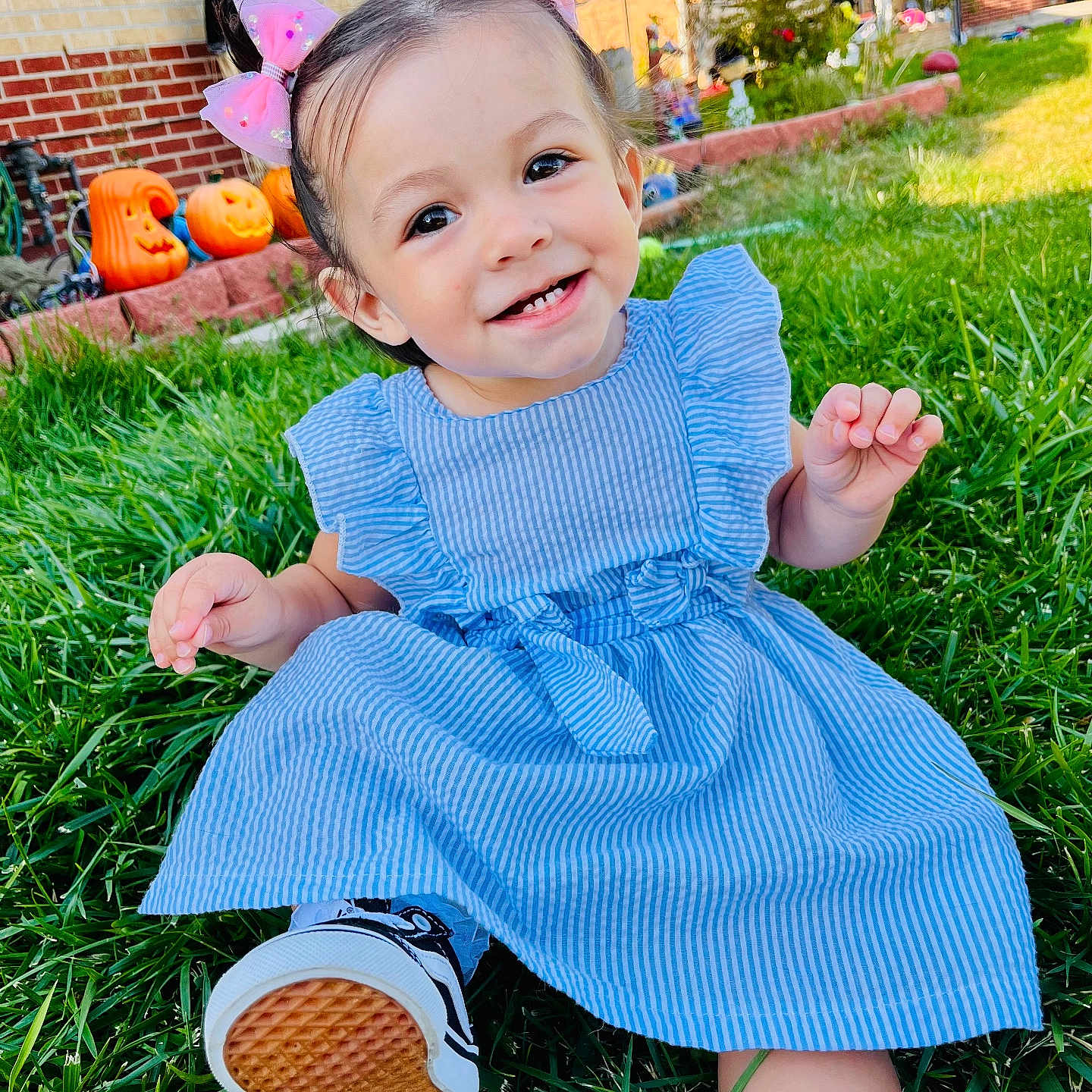 Kyra joined the competition — help win amazing prizes! baby, backyard, clothing, dress, face, footwear, grass, head, lawn, nature, outdoors, person, photography, plant, portrait, pottedplant, shoe, sitting, summer, yard