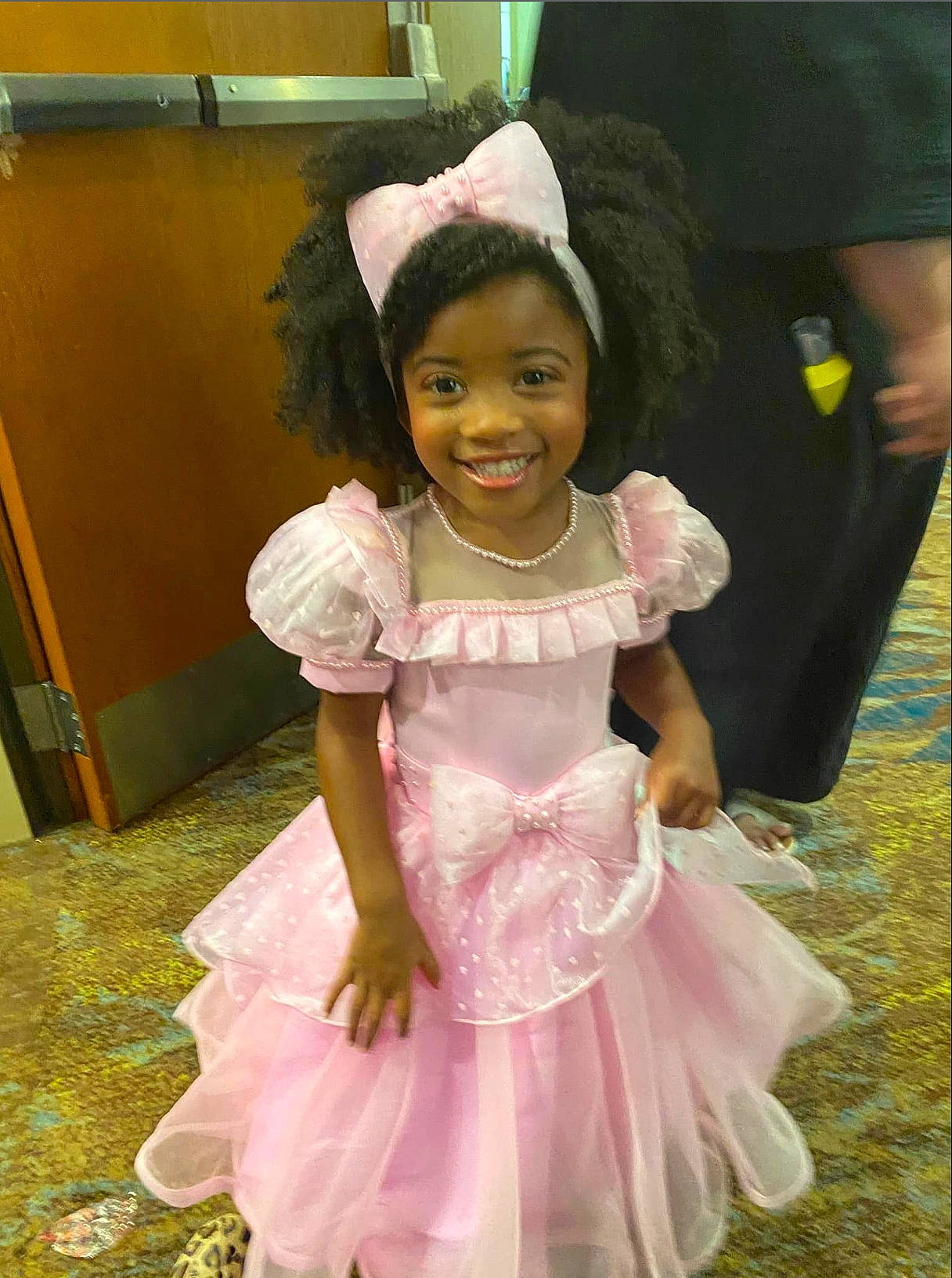 Rylie joined the competition — help win amazing prizes! baby_toddler_clothing, child, child_model, costume, day_dress, dress, embellishment, event, fashion_accessory, formal_wear, fun, happy, joy, magenta, person, pink, purple, ruffle, sleeve, smile