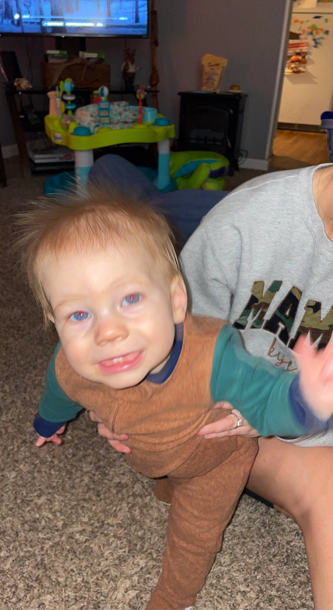 Kye joined the competition — help win amazing prizes! chair, cheek, child, event, flooring, fun, hairstyle, hardwood, head, iris, leisure, person, picture_frame, sitting, smile, standing, t_shirt, television, thumb, toddler