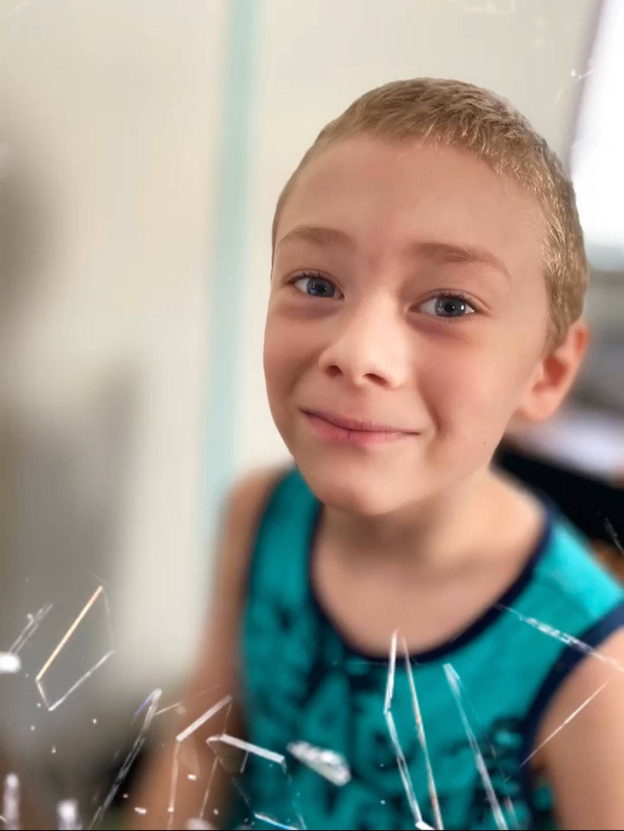 Dustin is registered to the contest to win money with this photo: child, electric_blue, flash_photography, fun, happy, jewellery, joy, person, portrait, portrait_photography, smile, t_shirt, toddler