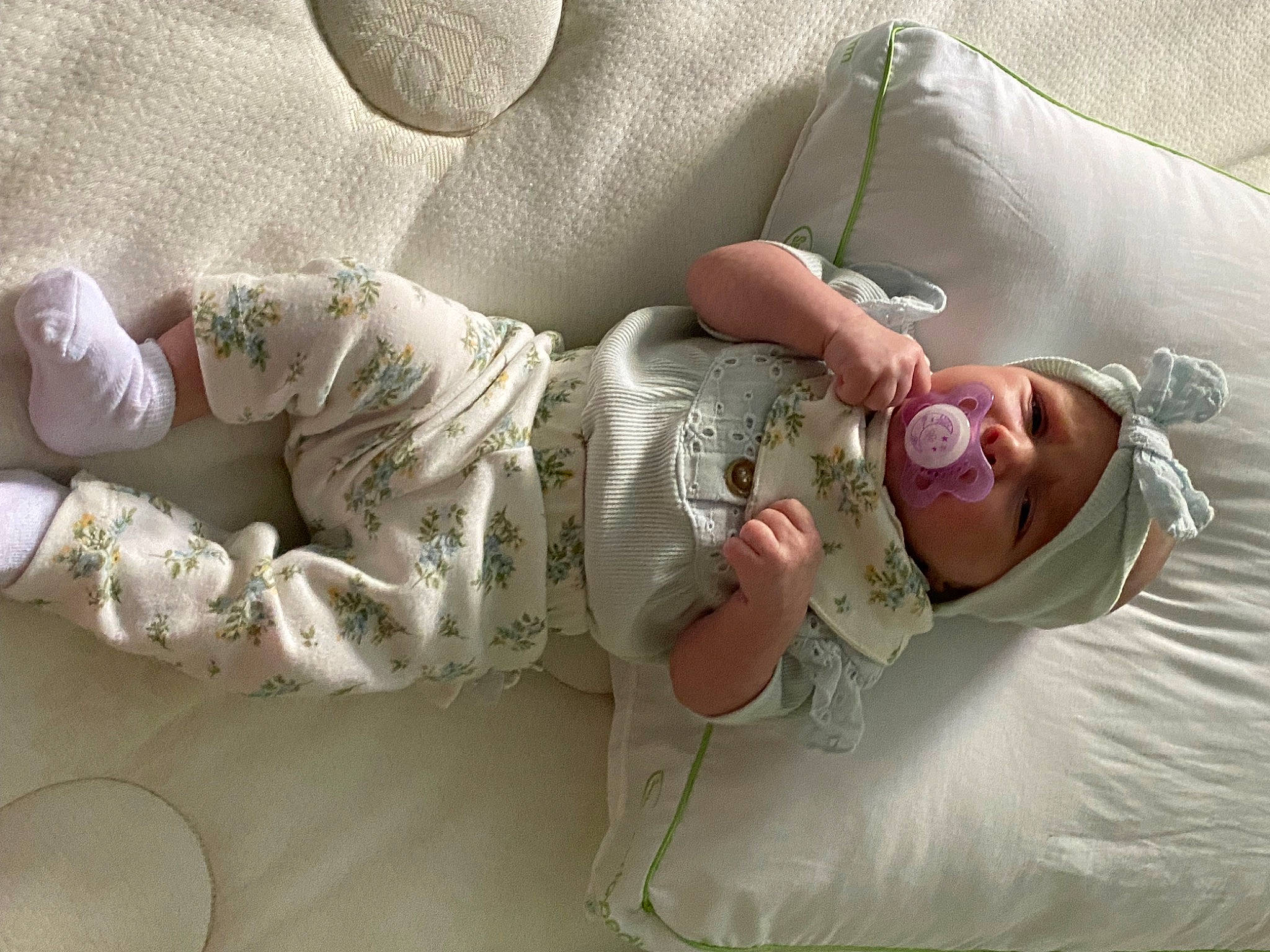 Madilynn joined the competition — help win amazing prizes! arm, baby, bedding, child, comfort, elbow, finger, gesture, hand, happy, headwear, human_body, human_leg, joint, linens, pattern, person, room, skin, sleeve