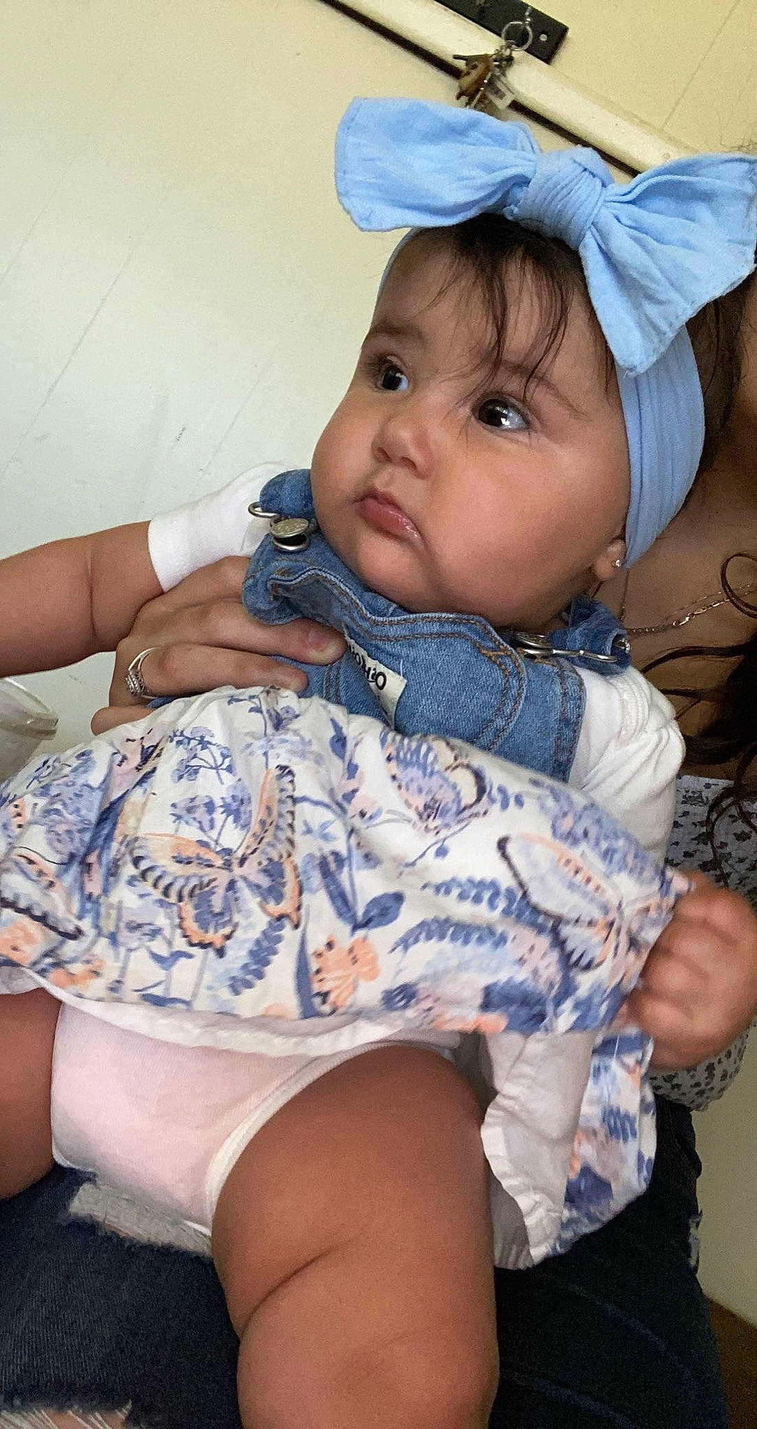 Nakiah is registered to the contest to win money with this photo: baby_toddler_clothing, cap, cheek, comfort, eye, eyelash, facial_expression, finger, happy, headwear, human, iris, lip, mouth, organ, person, pink, purple, skin, sleeve