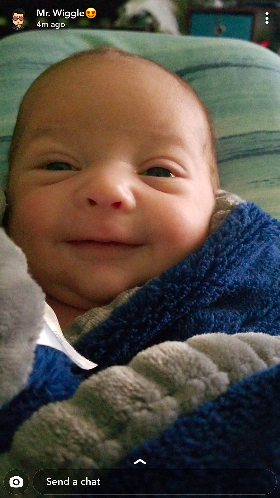 Clayton is registered to the contest to win money with this photo: baby, cheek, child, chin, close_up, ear, eye, eyebrow, face, facial_expression, forehead, head, knitting, lip, mouth, nose, person, skin, smile, toddler