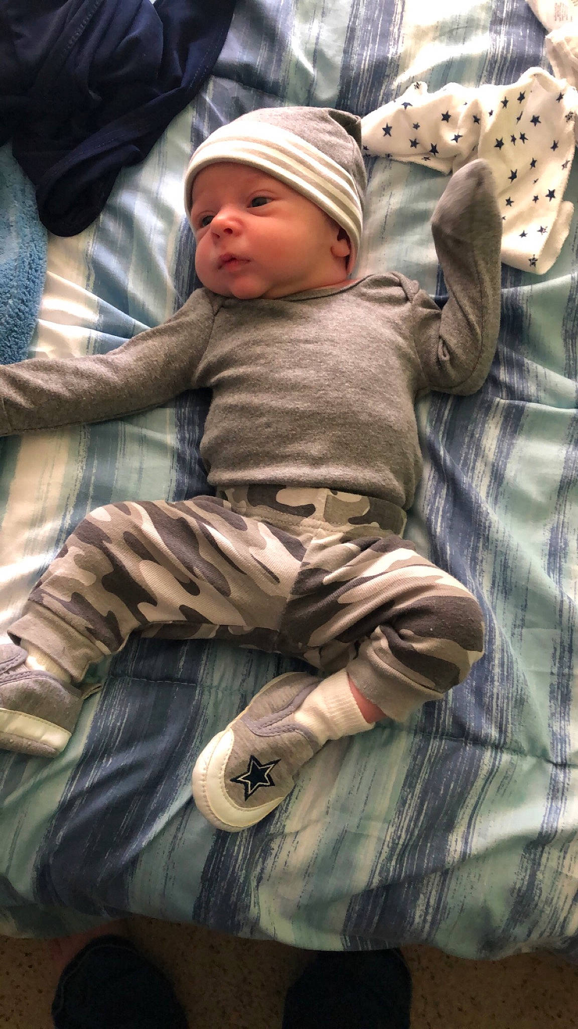 Clayton is registered to the contest to win money with this photo: baby, child, headwear, person, toddler