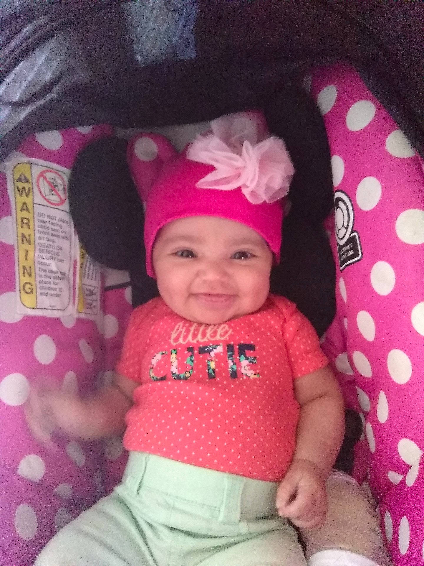 Juliana is registered to the contest to win money with this photo: baby_products, cheek, child, day, design, hair_accessory, headband, headgear, infant, joy, magenta, pattern, person, pink, product, skin, smile, textile, toddler