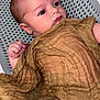 Tommy-Lee joined the competition — help win amazing prizes! baby, infant, face, cloth, fabric, basket, skin, hand, expression, portrait, newborn, person, cute, child, indoors, soft_texture, wrapped, resting, looking_away, closeup