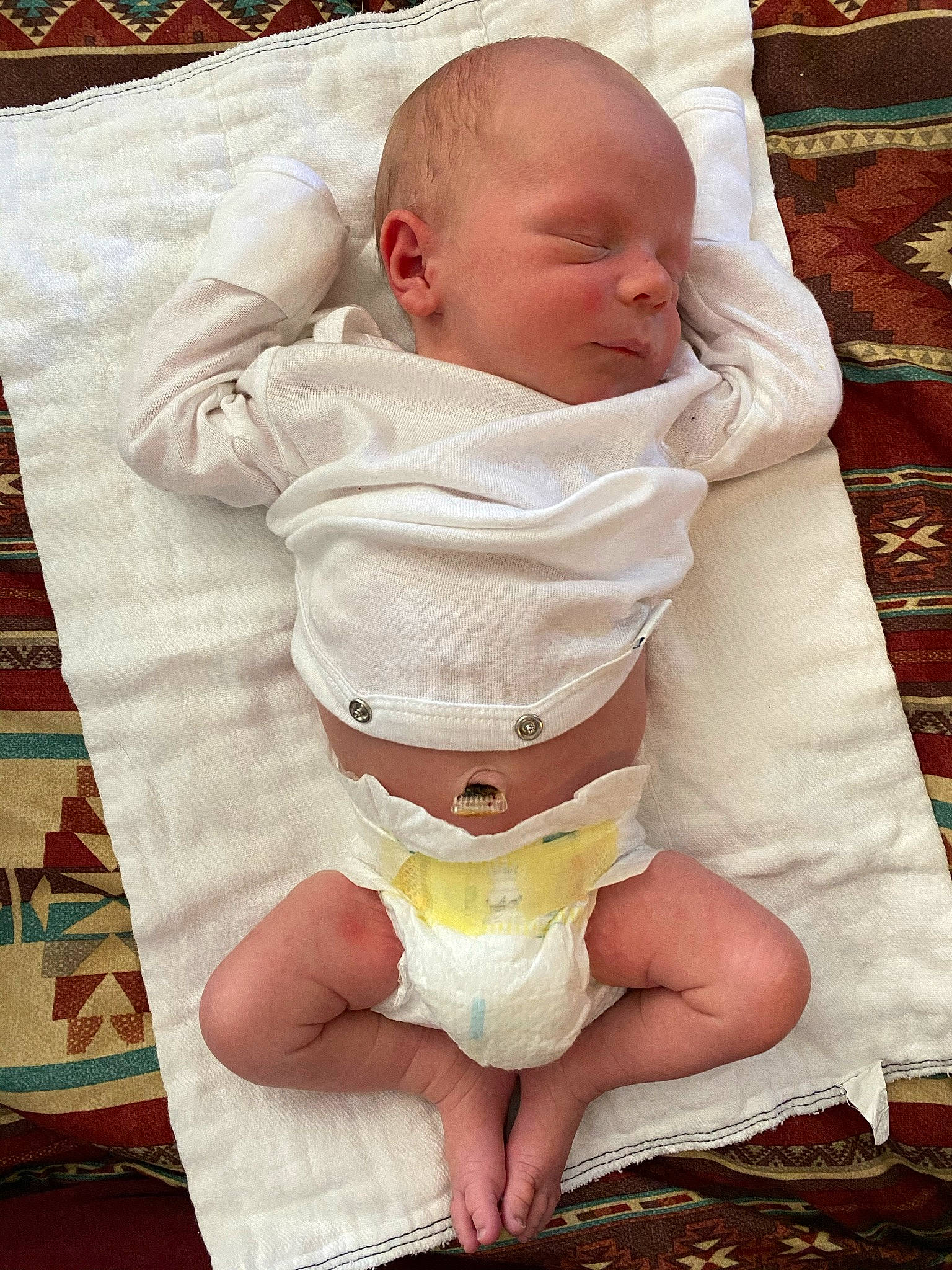 Sullivan is registered to the contest to win money with this photo: baby, baby_products, baby_safety, baby_sleeping, baby_toddler_clothing, bedtime, cheek, child, comfort, foot, infant_bodysuit, linens, pattern, person, pink, skin, sleeve, stomach, thigh, thumb