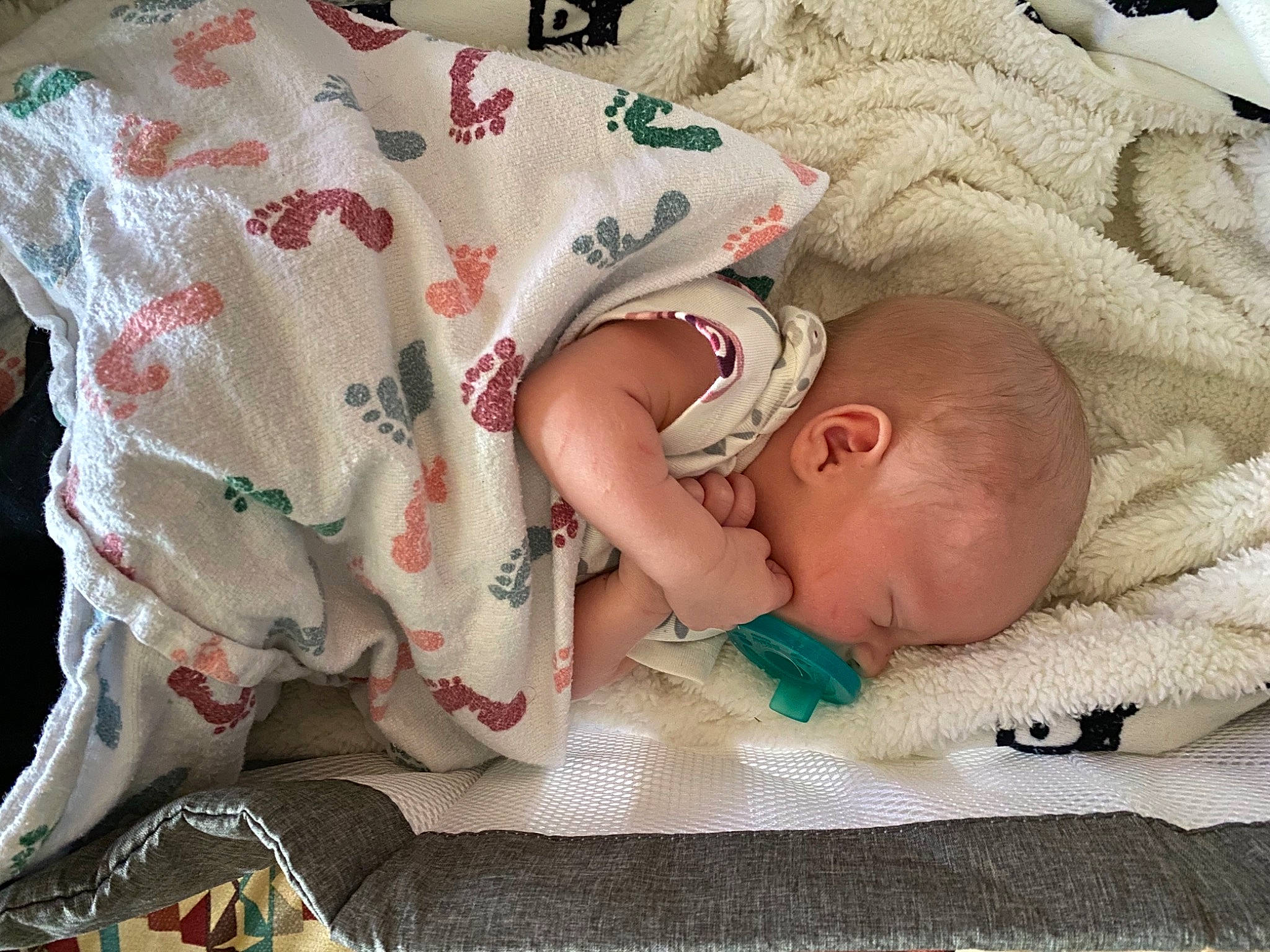 Sullivan joined the competition — help win amazing prizes! baby, baby_products, baby_safety, baby_sleeping, baby_toddler_clothing, bed, bedding, bedtime, child, comfort, flesh, linens, mammal, nap, pattern, person, product, room, skin, sleeve