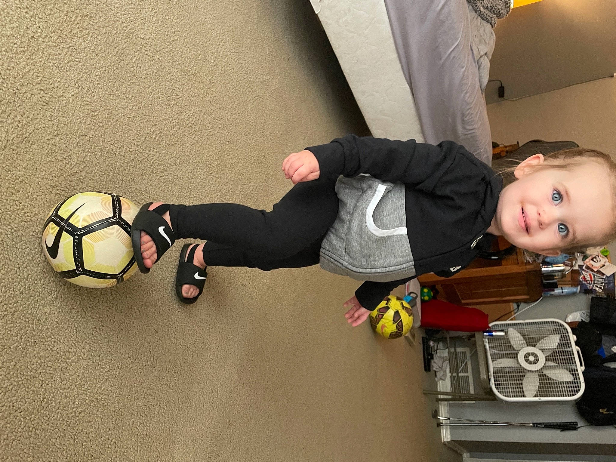 Fenner joined the competition — help win amazing prizes! ball, flooring, football, fun, human_leg, joy, knee, person, player, product, shoe, smile, sneakers, soccer, soccer_ball, sports_equipment, sports_gear, sportswear, t_shirt, toddler