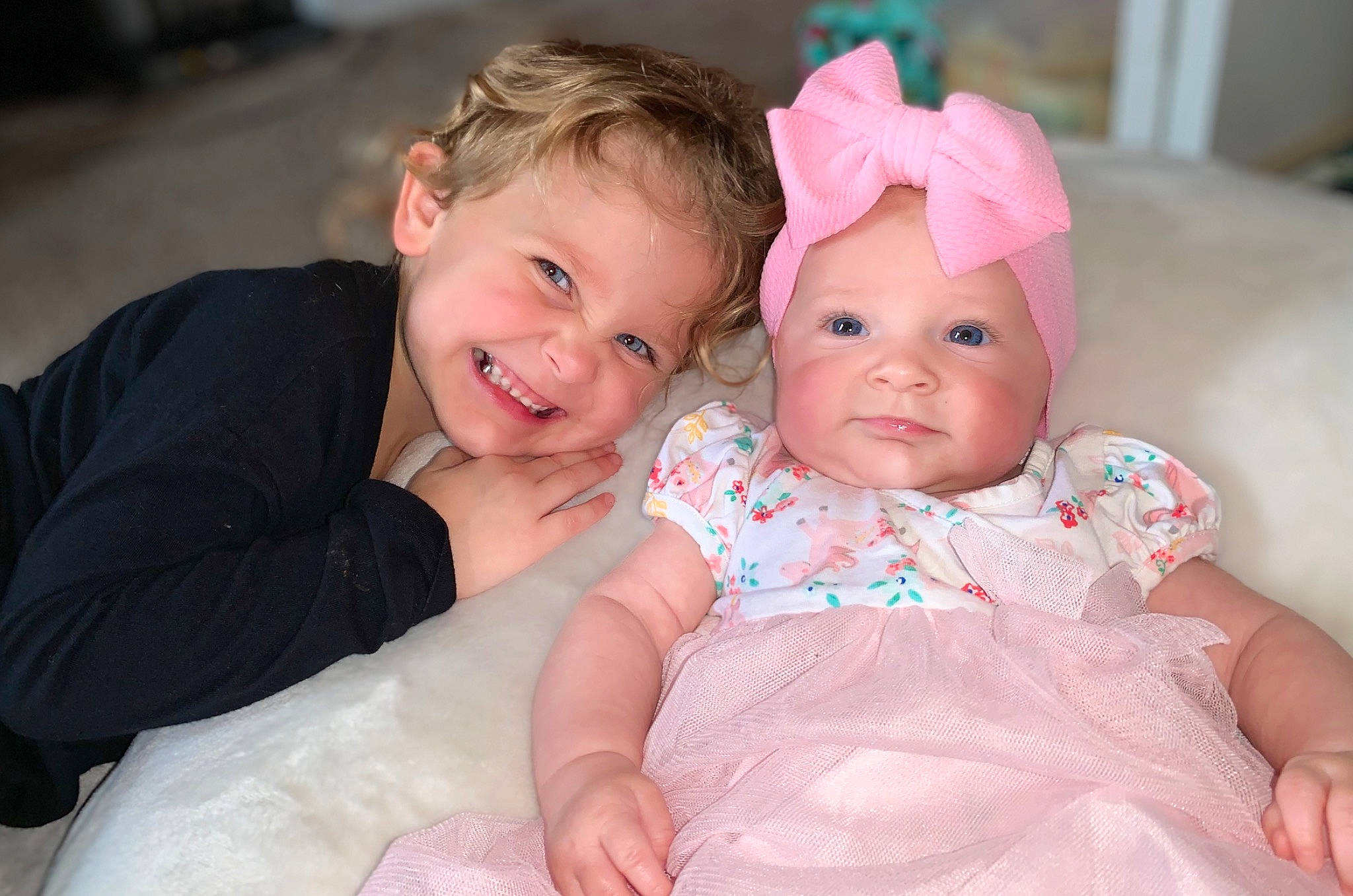 Lily joined the competition — help win amazing prizes! baby, baby_toddler_clothing, cheek, chin, dress, eye, face, facial_expression, finger, flash_photography, fun, happy, head, headwear, human, human_body, iris, joy, person, pink