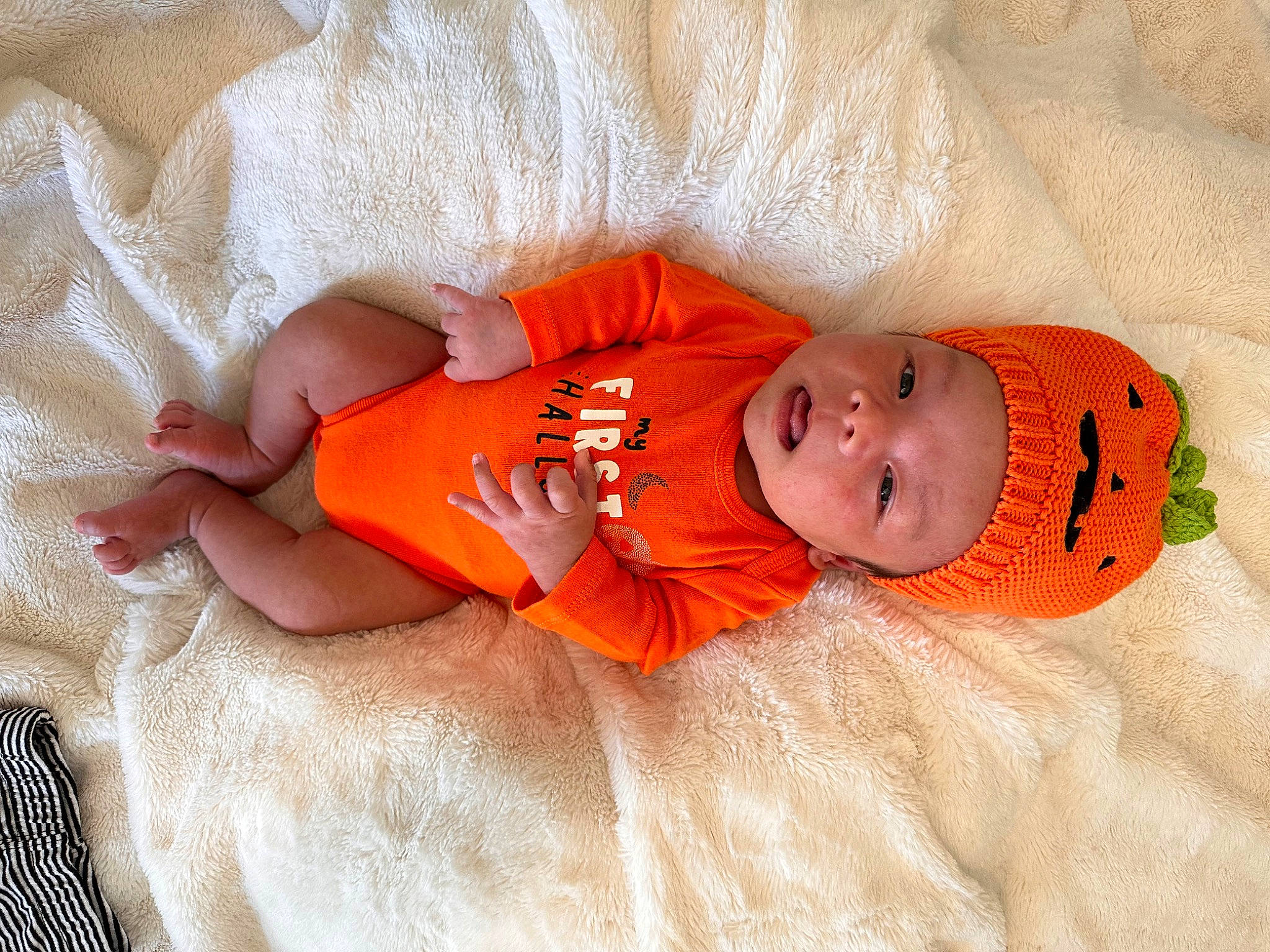 Sebastian joined the competition — help win amazing prizes! abdomen, baby, baby_products, baby_sleeping, baby_toddler_clothing, bedtime, child, comfort, eye, face, foot, head, headwear, linens, orange, pattern, person, room, skin, sleep